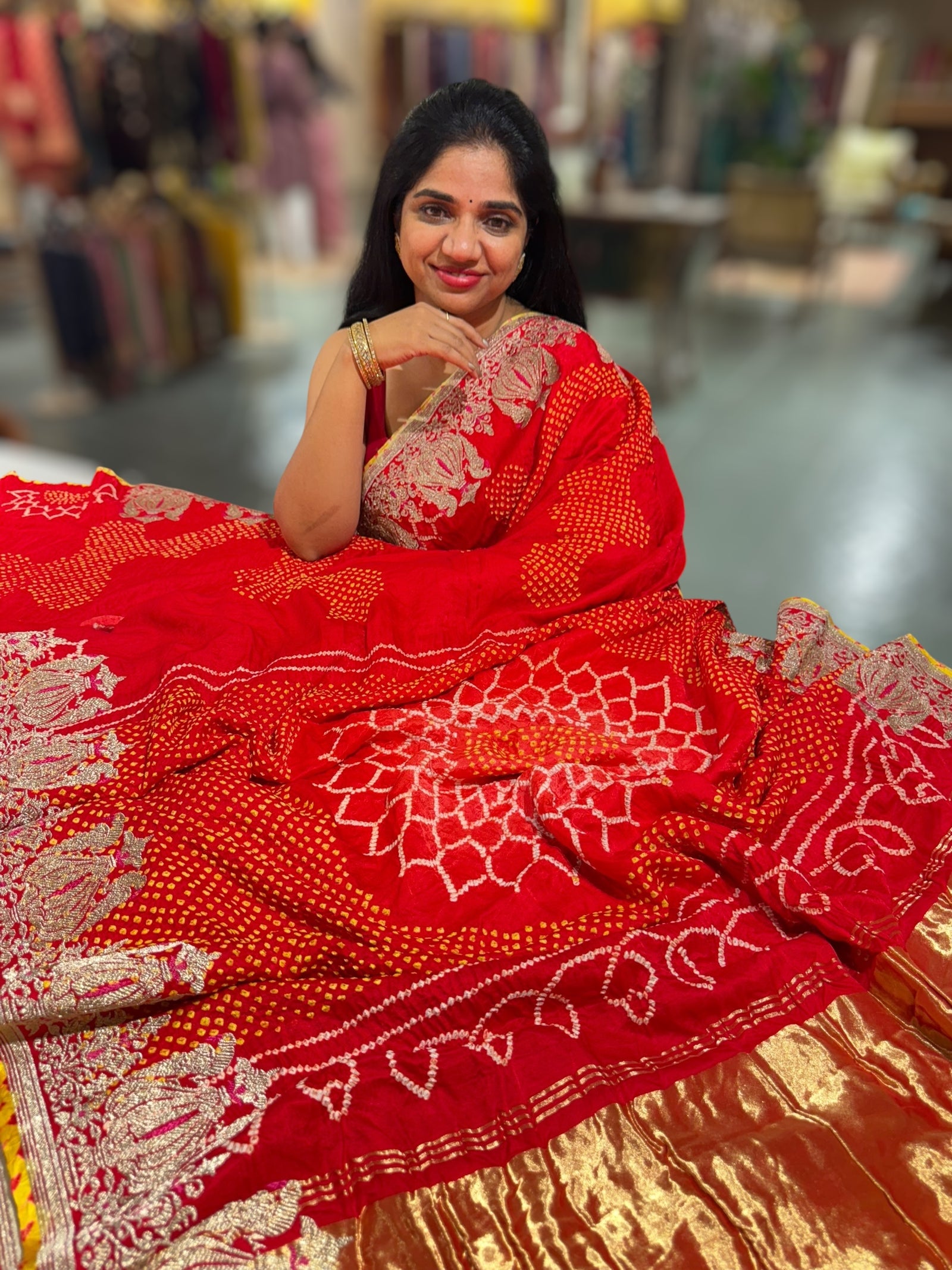 Orangish Red Designer Rai Bandhej Saree With Embroidered Border