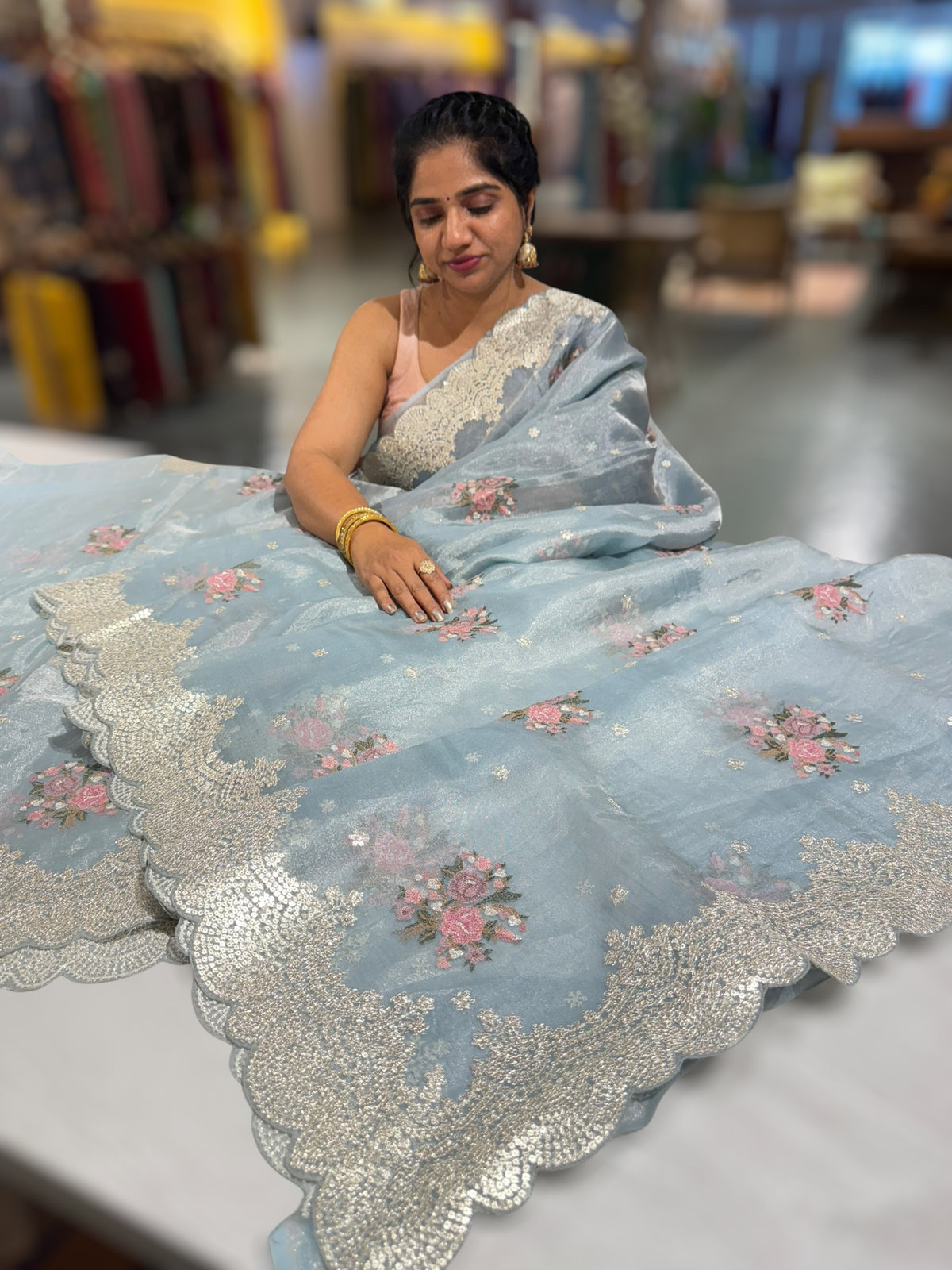 Pastel Blue Tissue Saree With allover Petite Point Motifs & Pittai Sequence Borders