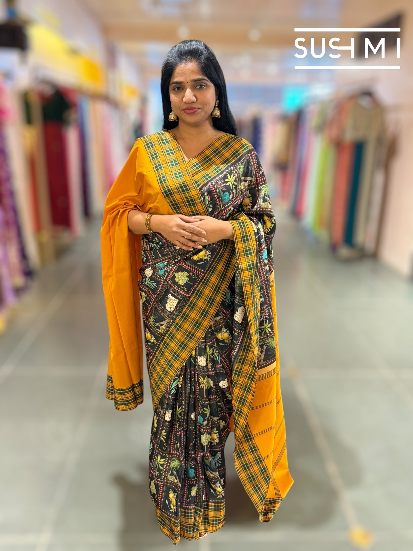 Black printed soft silk saree with burberry checks border : D62F033