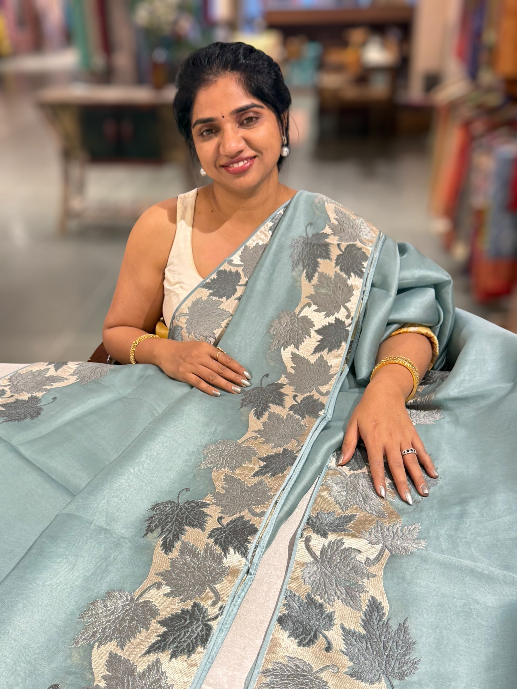 Dark Powder Blue Organza Saree with Stunning Leaf Embroidered Border