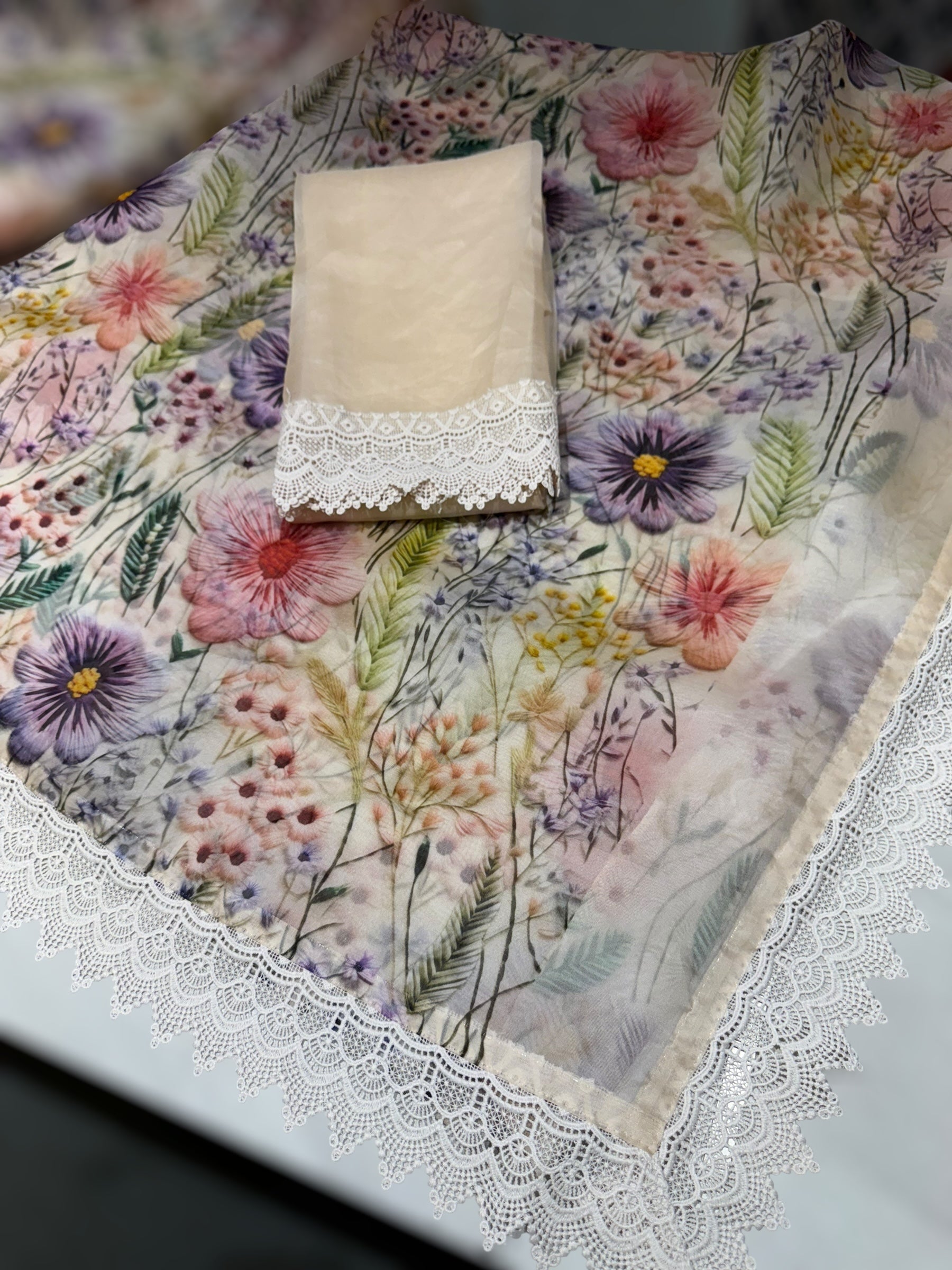 Ivory Organza 3D floral Printed Saree hemlined with crotia lace