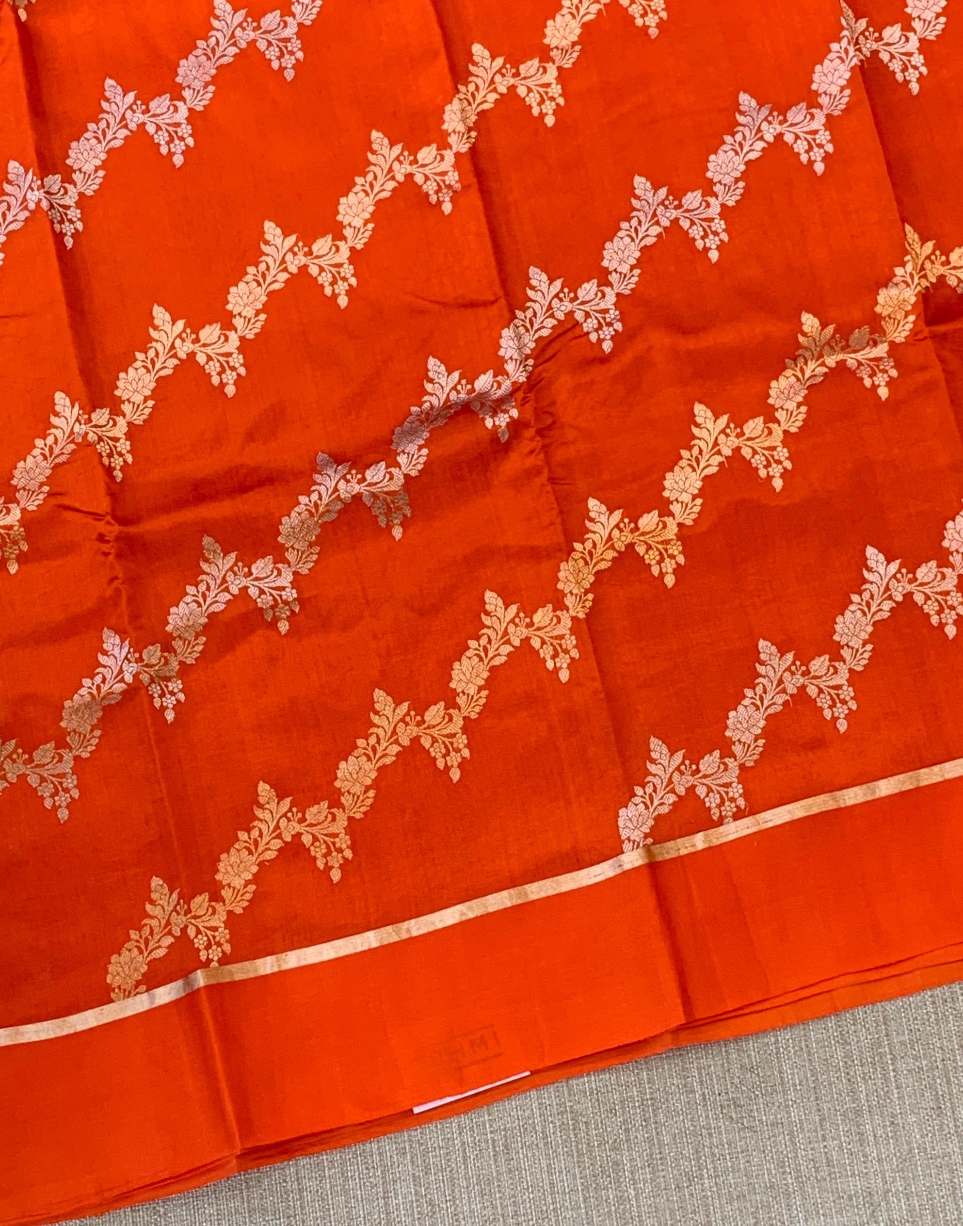 Orange Raw Mangoe Silk Saree in half and half style