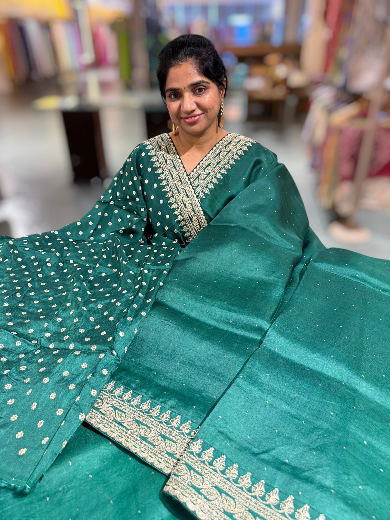 Emerald Green Pure Organza Saree with allover mukaish work & sabyasachi borders