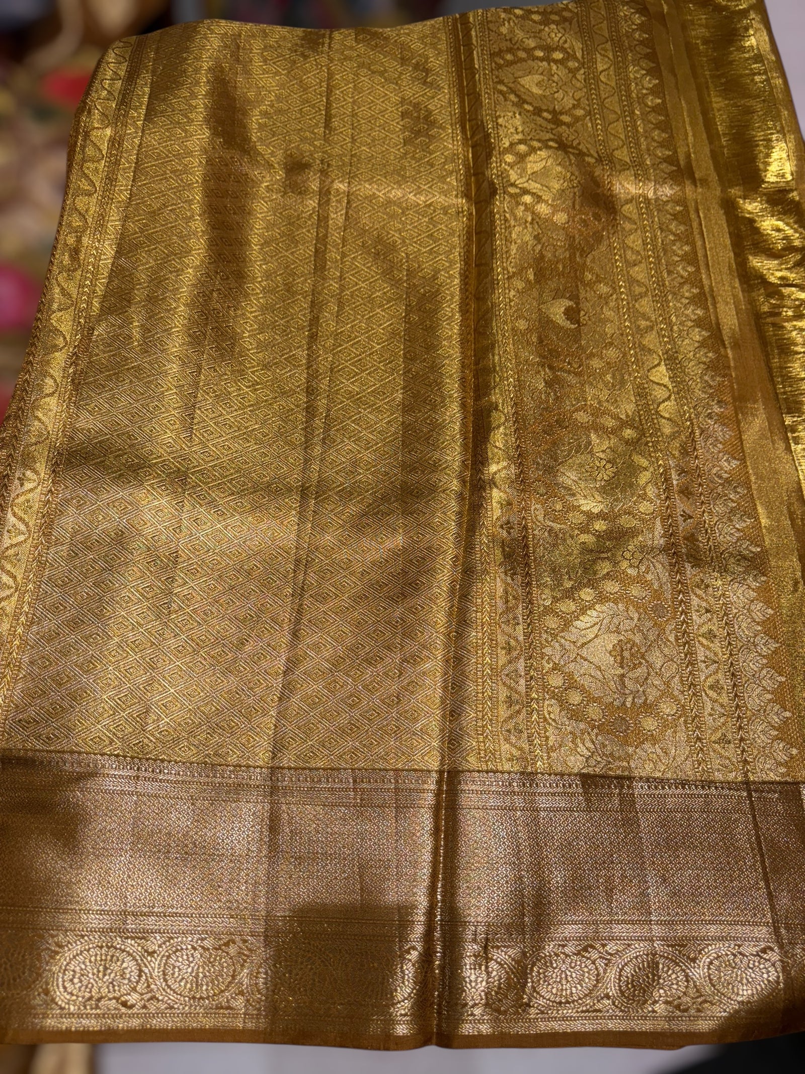 Molten Gold Kanjeevaram Tissue Saree with allover embroidery
