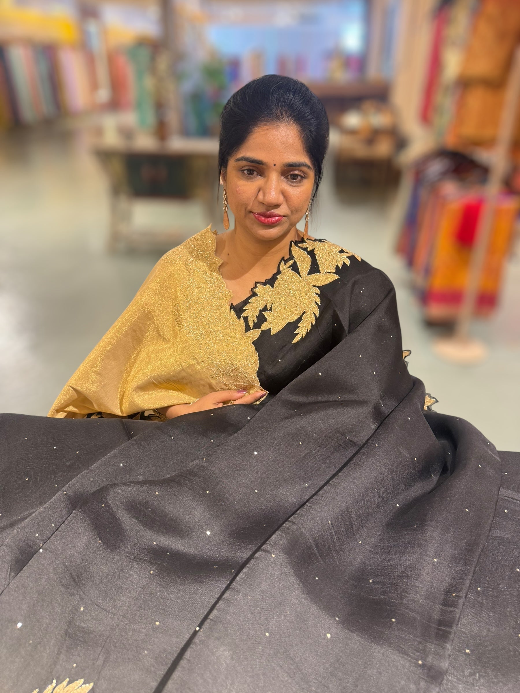 Black Organza Saree with Mukaish work and tissue floral applique cutwork border