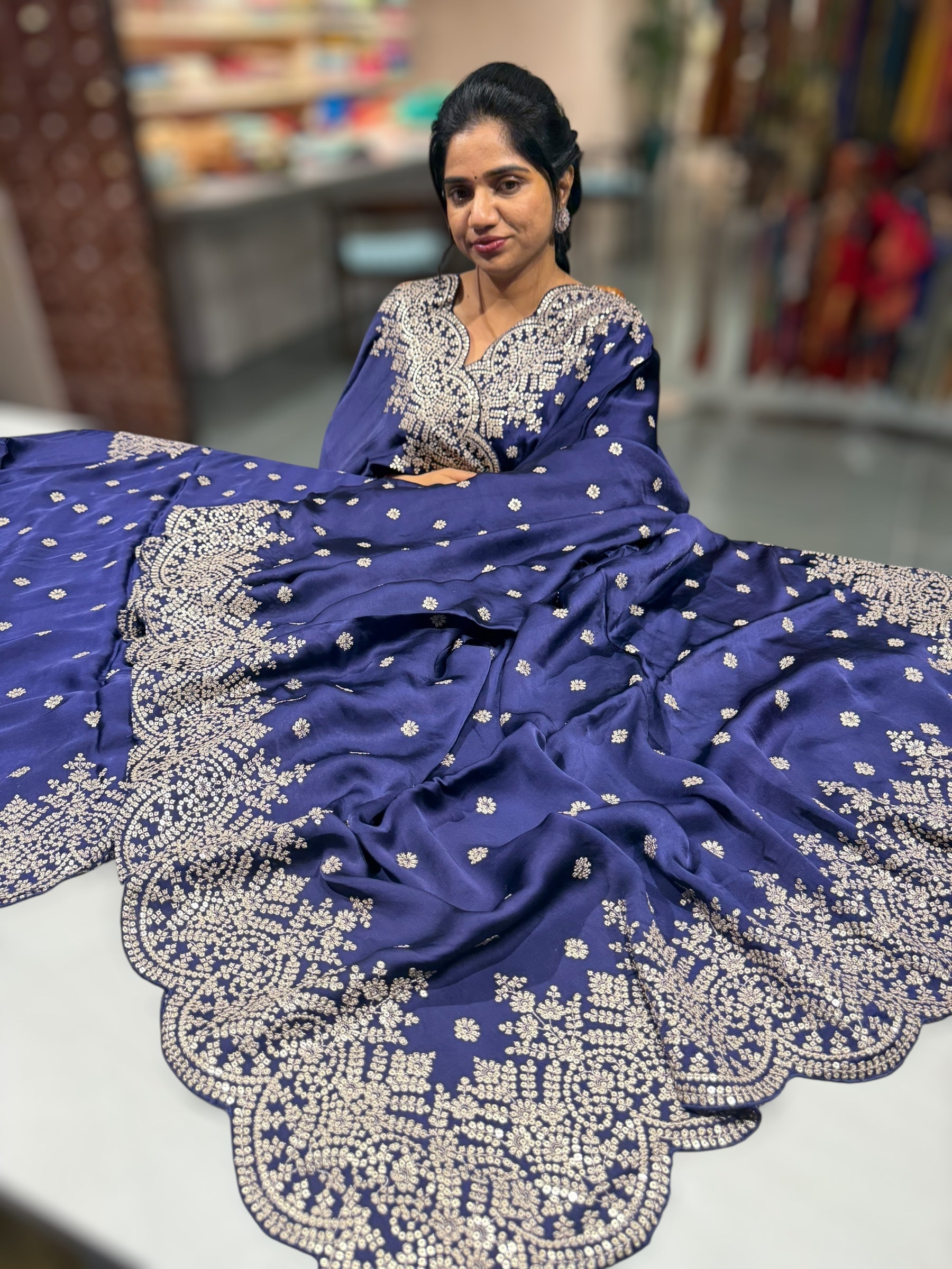Purplish Blue Satin Saree with heavy sequnce embroidered scallop Border