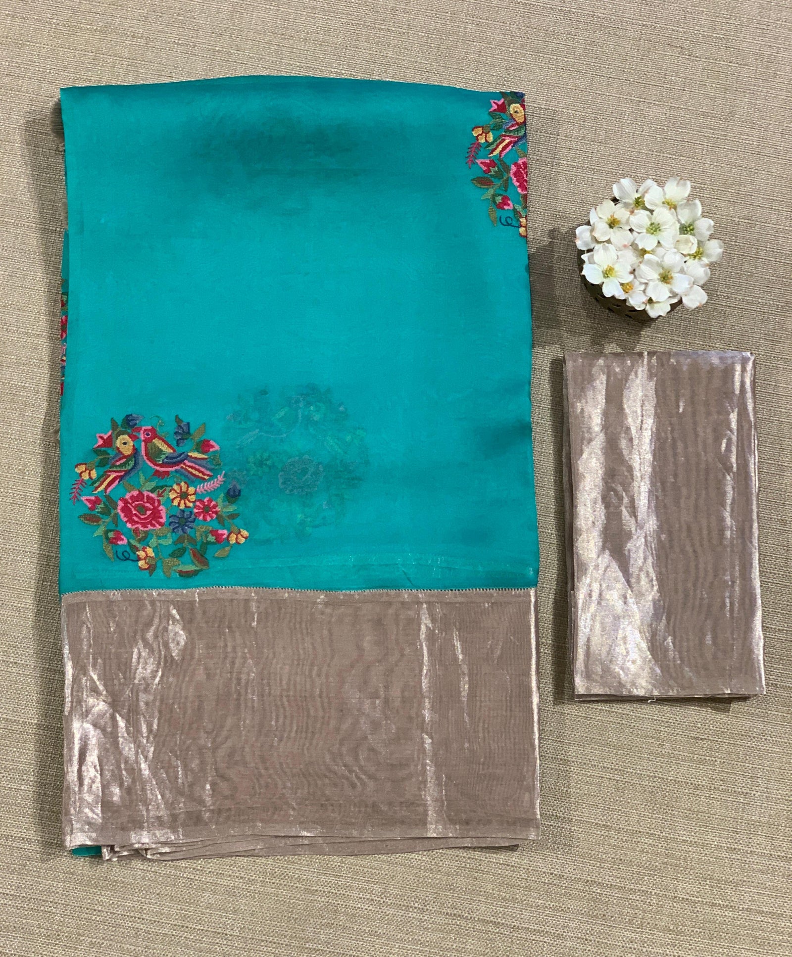 Teal Organza Saree with pure Tissue Border