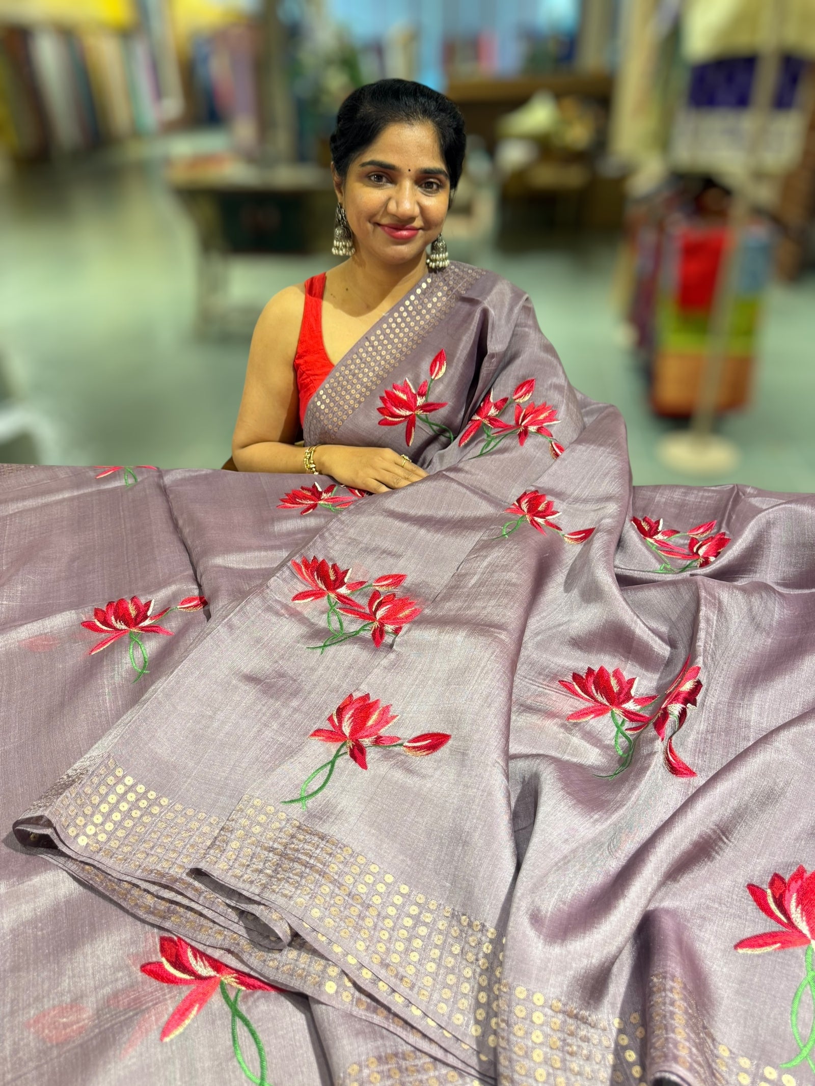 Mauve pure handloom tussar byloom saree with lotus embroidered bunch motifs