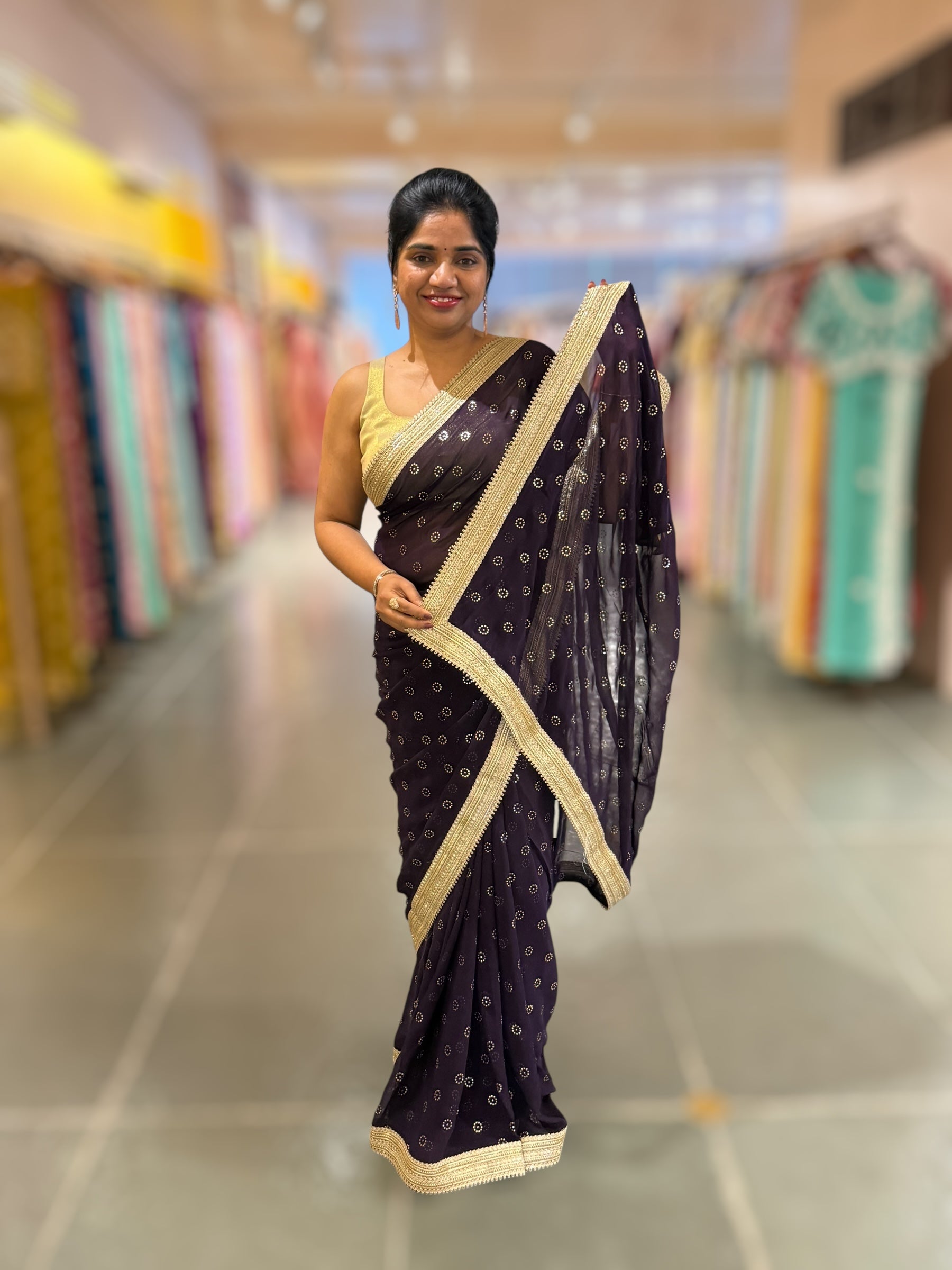 Violet Georgette Saree with stick on Badla in flower pattern