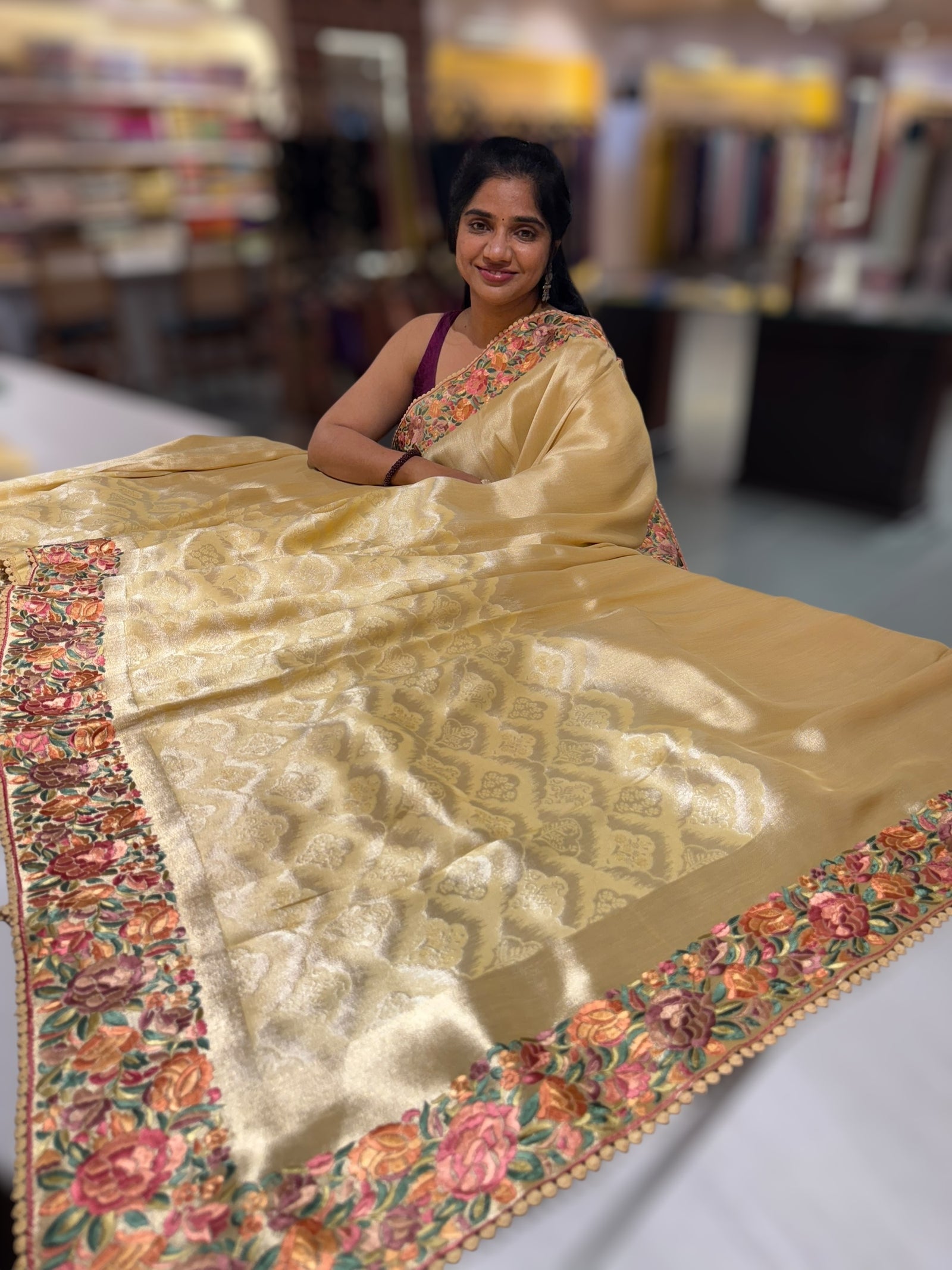 Pastel yellow Banarasi Brocade tissue saree with tonchui style weaving and parsi gara embroidered border