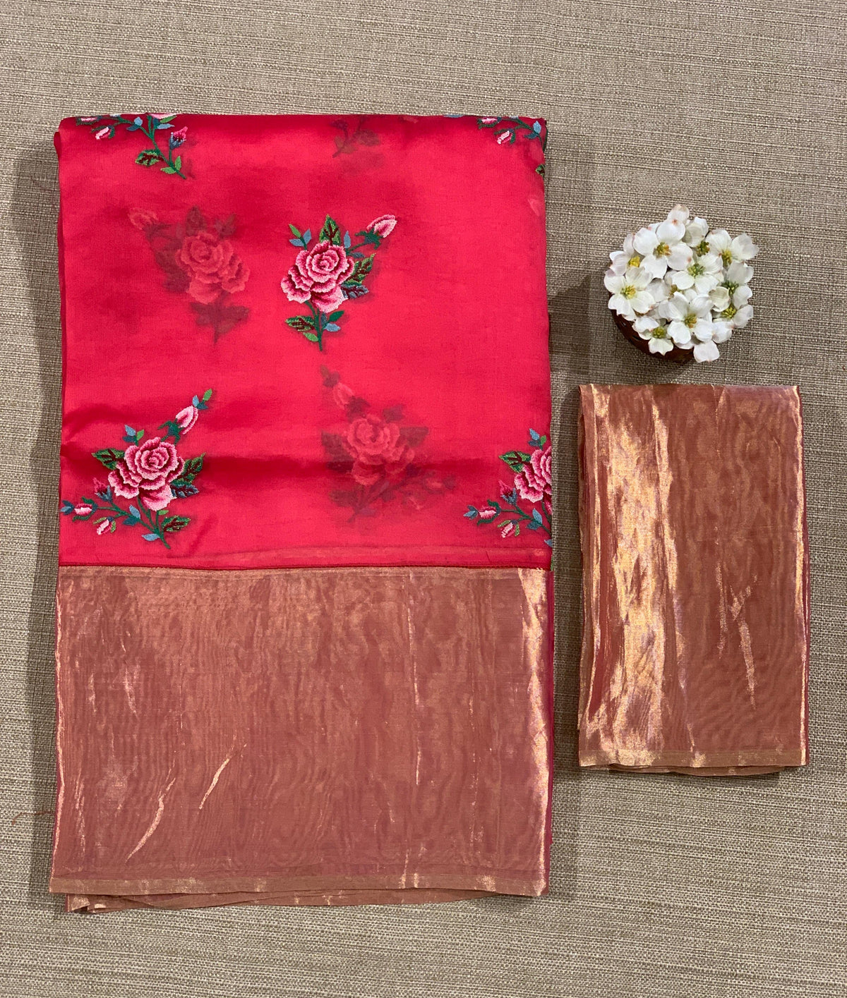 Pinkish Red Organza Saree with pure Tissue Border