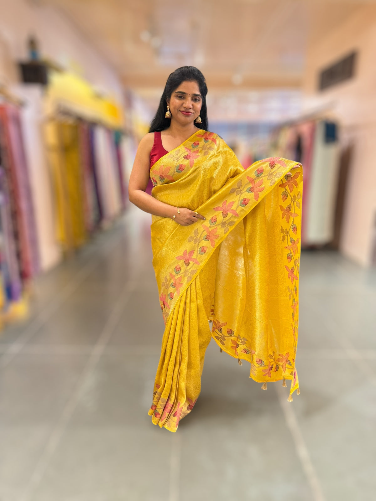 Yellow Banarasi Brocade tissue saree with tonchui style weaving & pythani inspired embroidered border