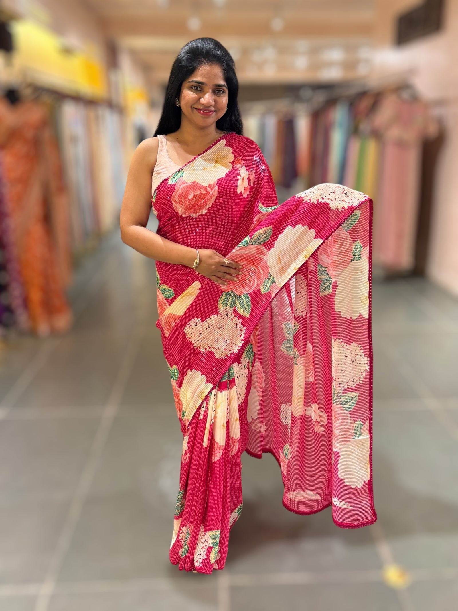Reddish Pink georgette sequence saree with statement floral print