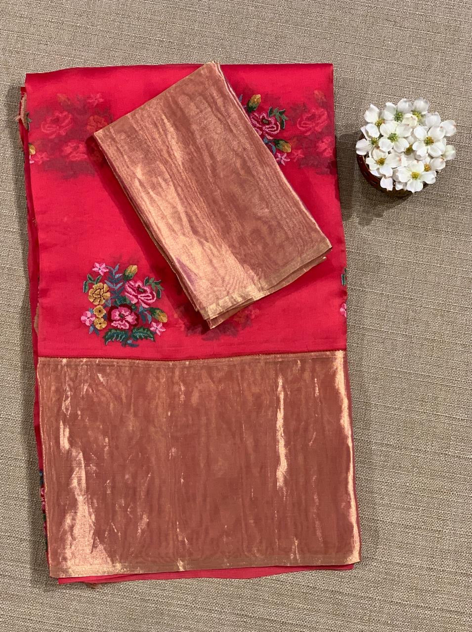 Pinkish Red Organza Saree with pure Tissue Border