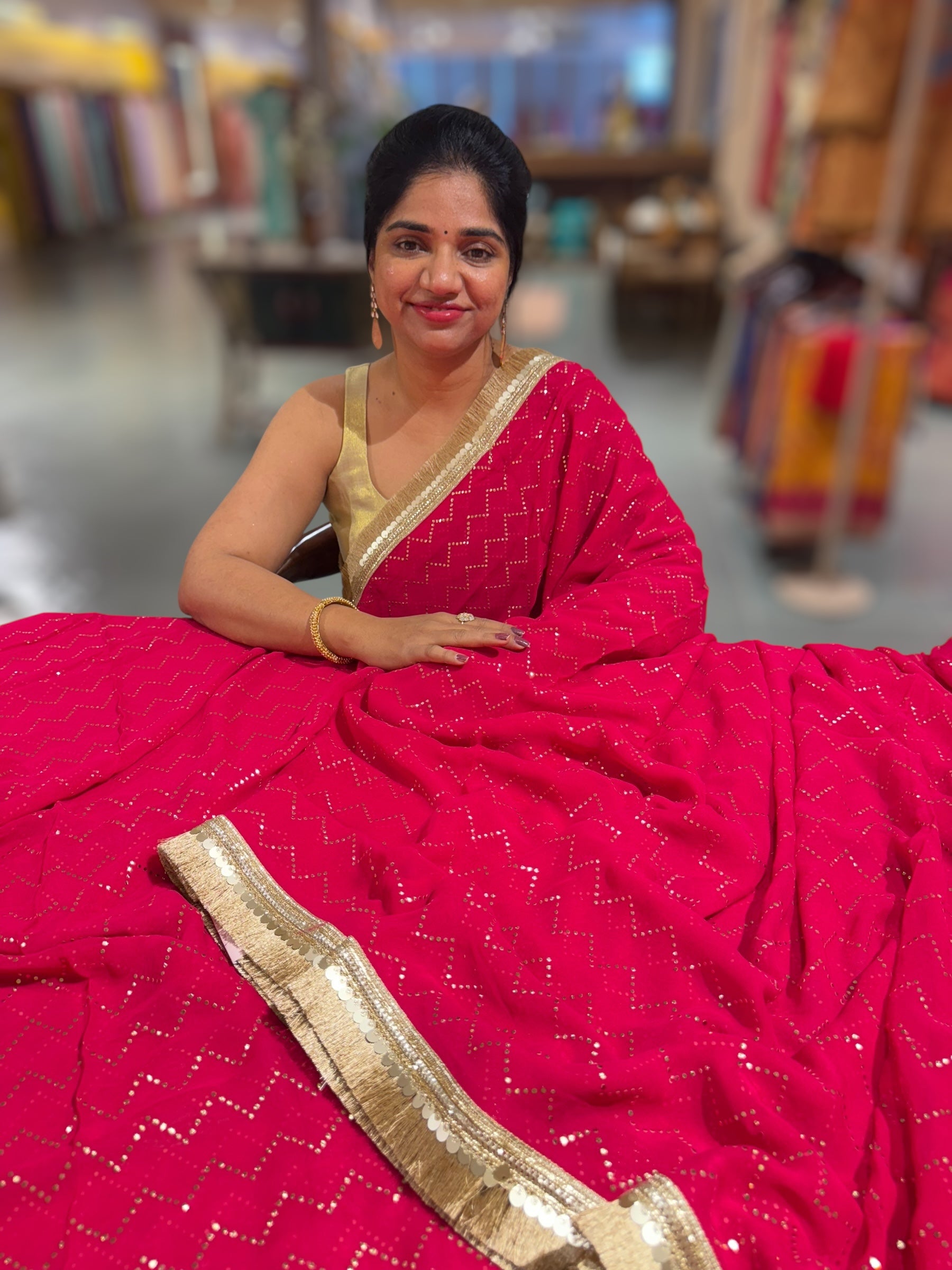Dark Pink Georgette Saree with stick on Badla in zigzag pattern