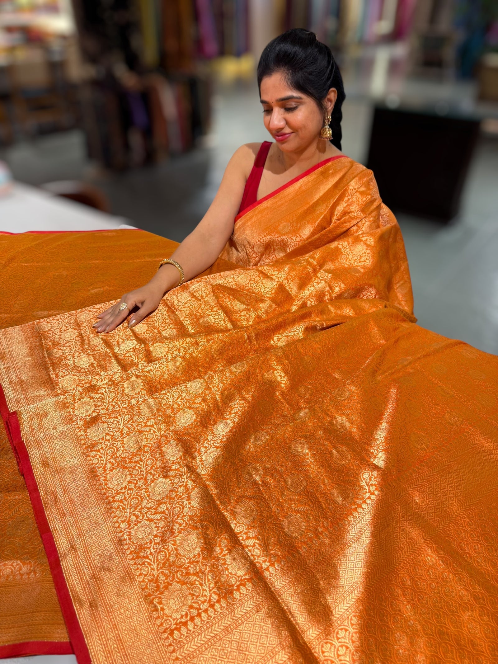 Orange Banarasi katan Tonchoi weaving Saree with red selvedge