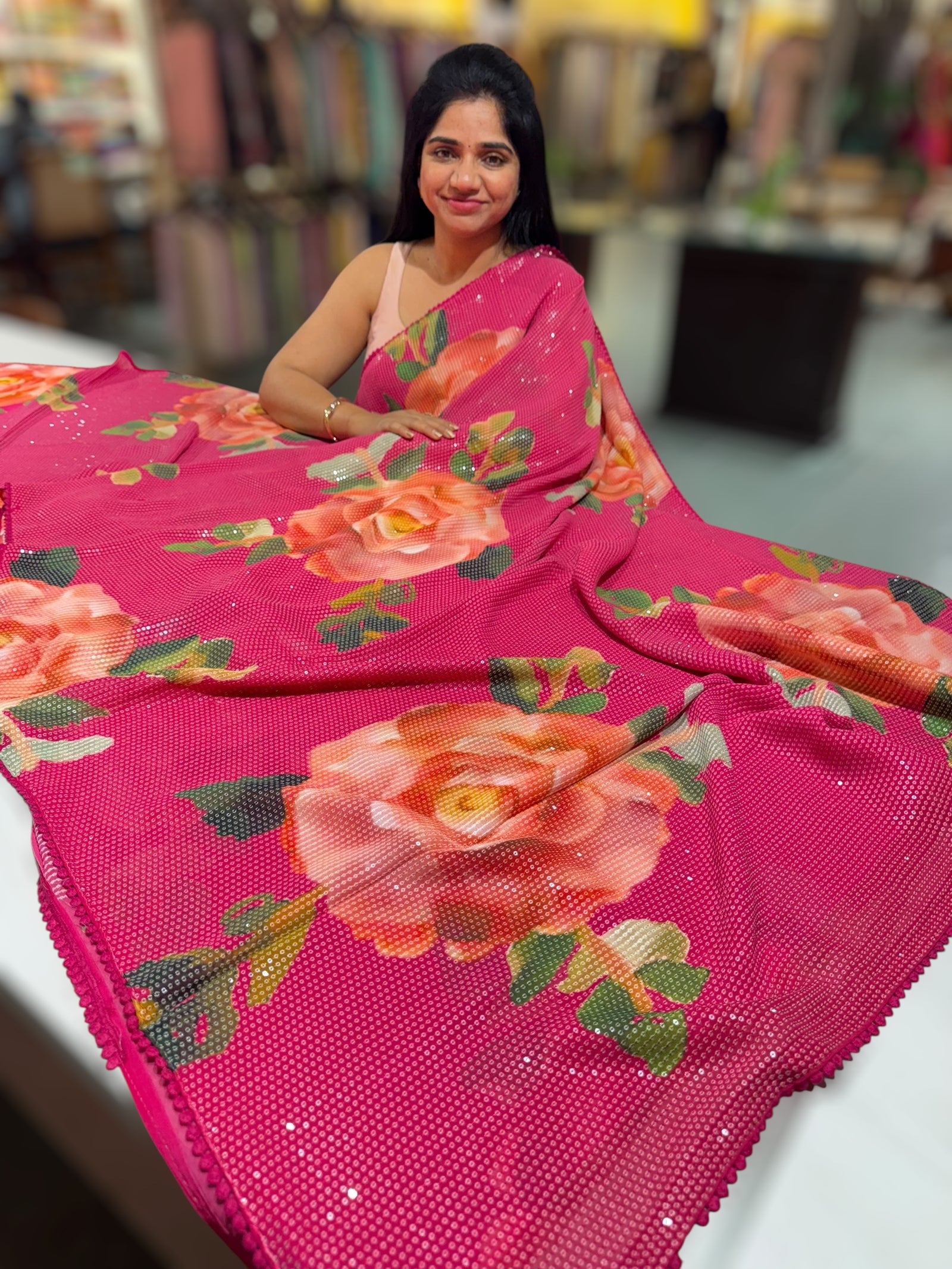 Dark Pink georgette sequence saree with statement floral print