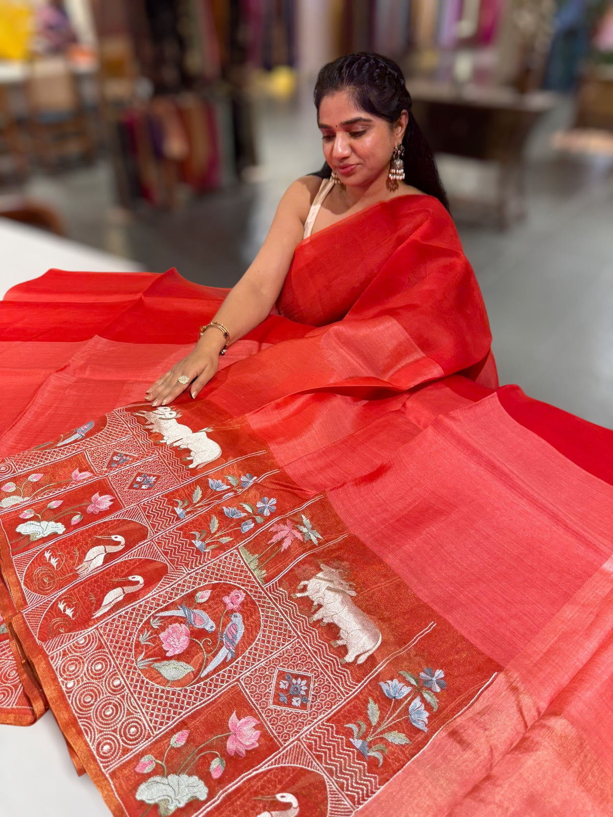 Reddish Orange Kora-Tussar blend Handloom Saree with Tissue embroidered Skirt Border