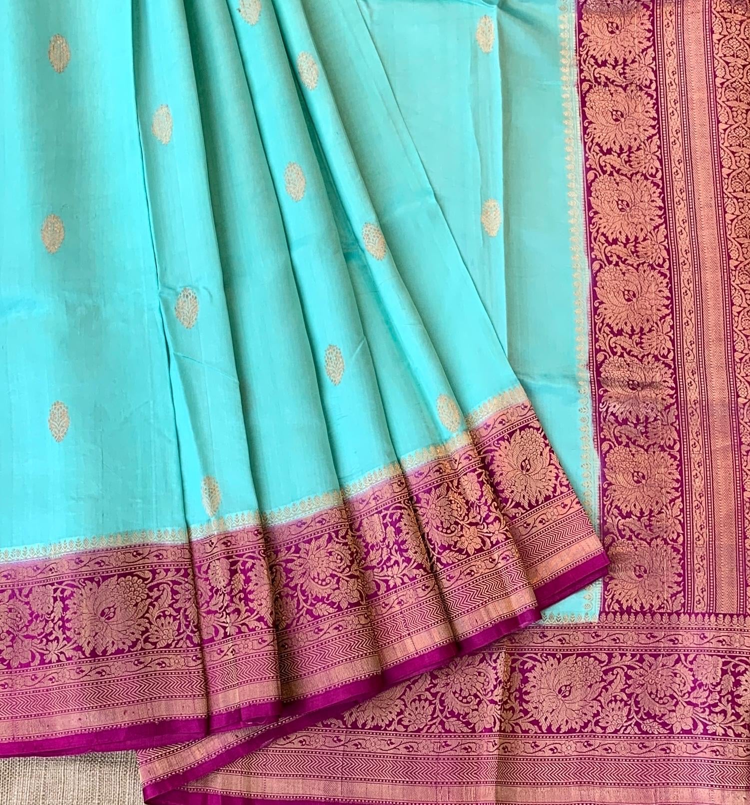 SeaBlue & Majenta Combo Raw Mangoe Silk Saree with heavy weaving mashru border & kaduwa woven motifs.