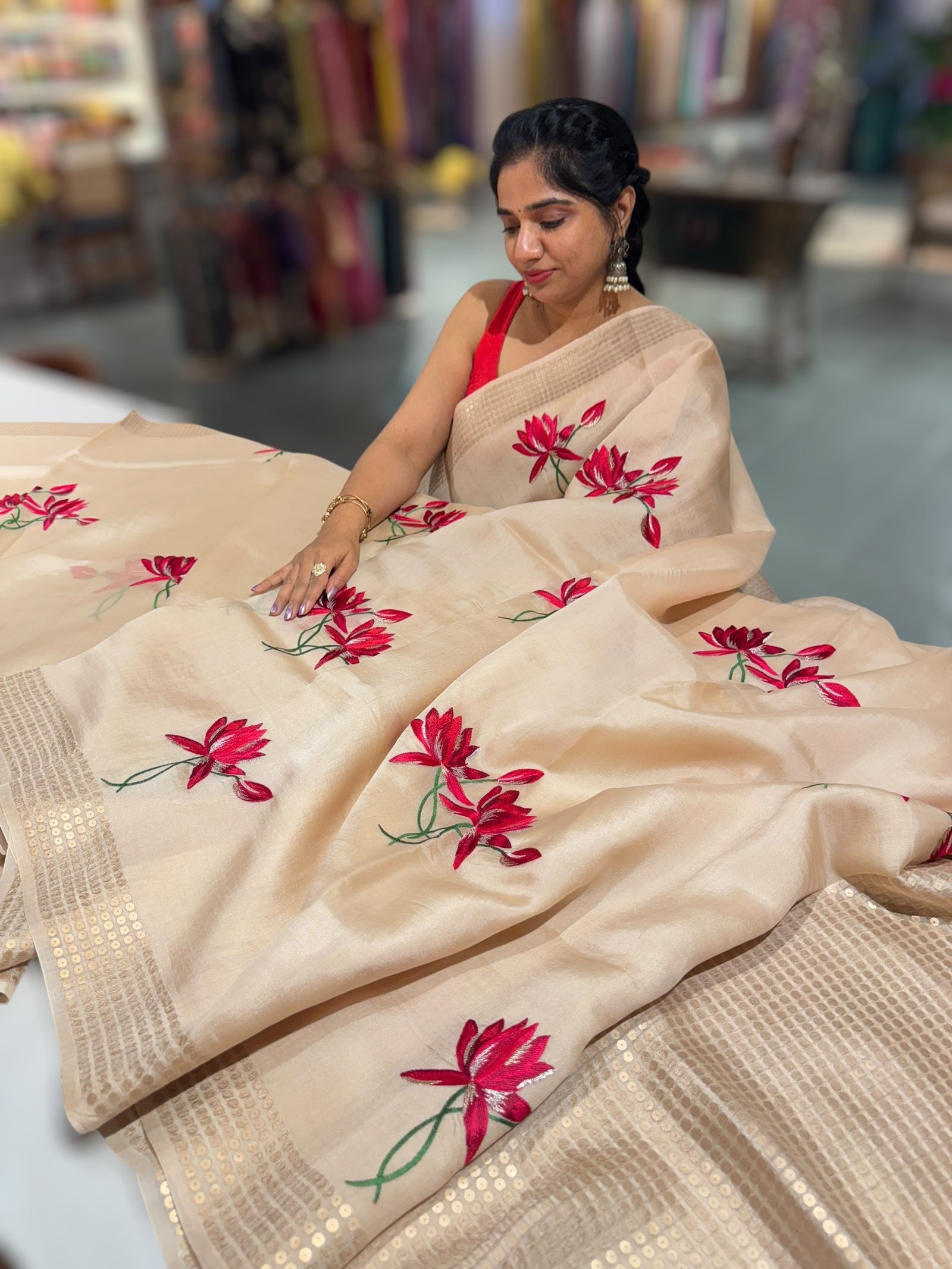 Ivory pure handloom tussar byloom saree with lotus embroidered bunch motifs