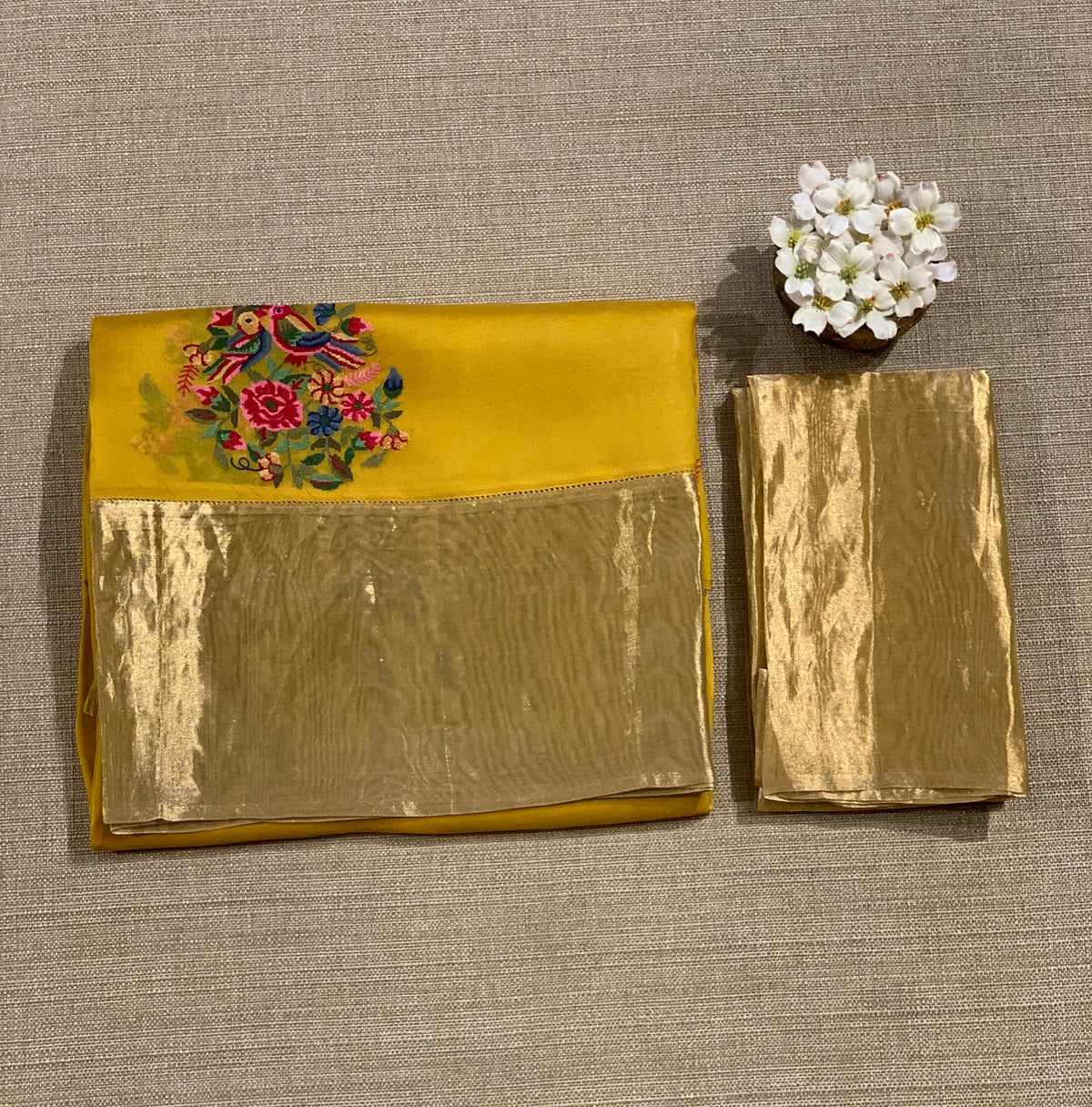 Yellow Organza Saree with pure Tissue Border