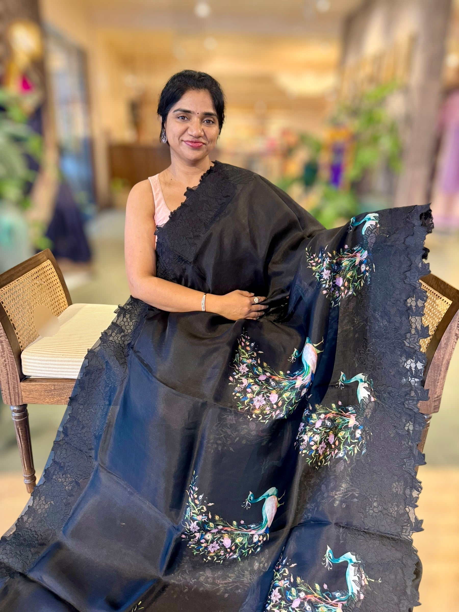 Black Printed Organza Saree With Chantilly Lace Style Embroidered Border.