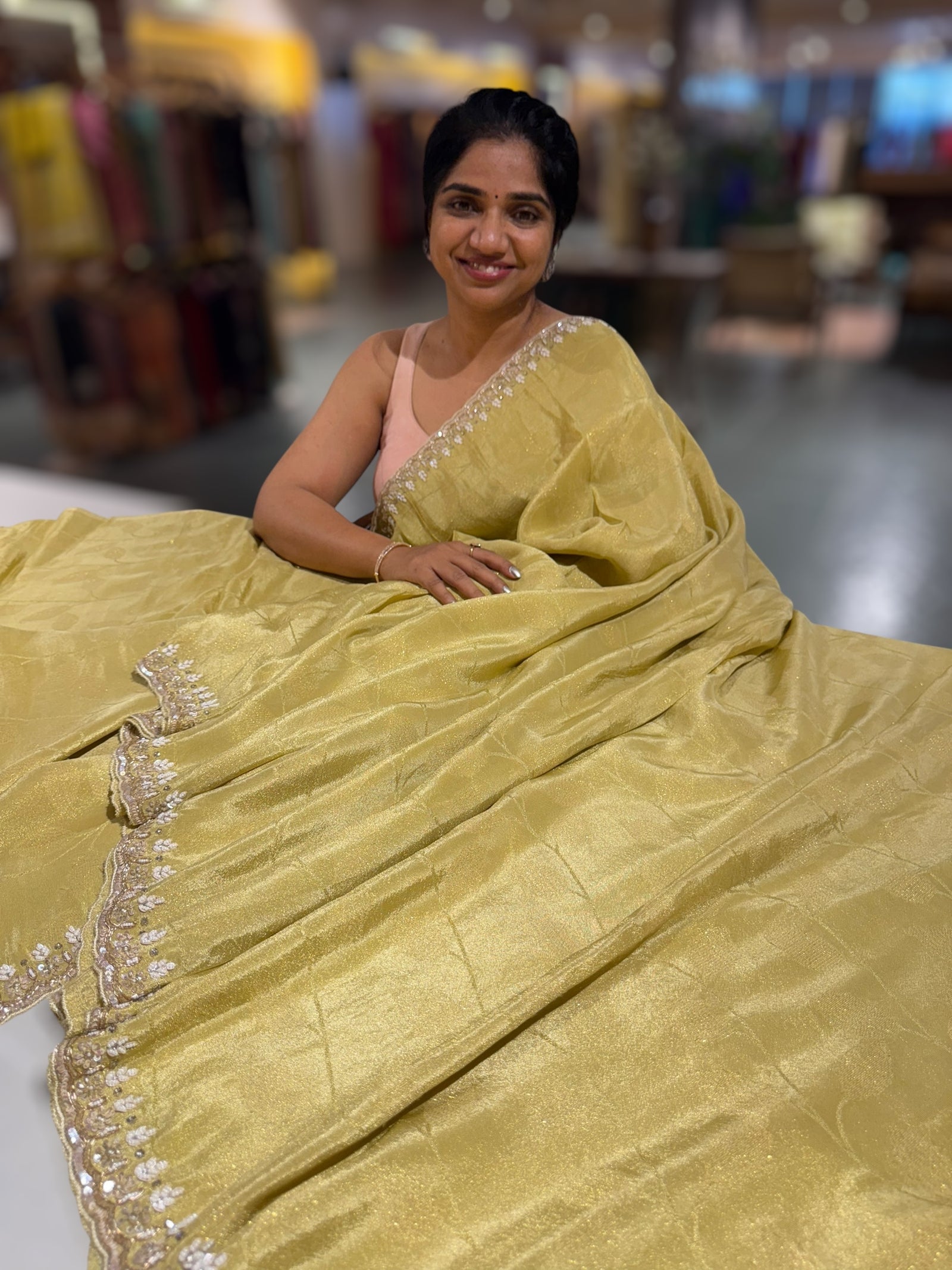 Pastel Yellow Tissue Gorgette Saree With Hanwork Border and Blouse.