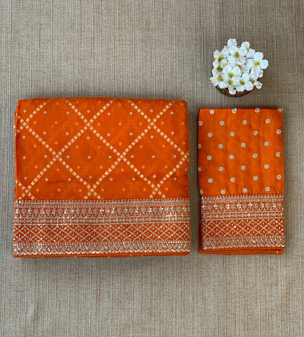 Orange Fancy Banarasi Bandhini georgette saree with sabhyasachi borders and blouse