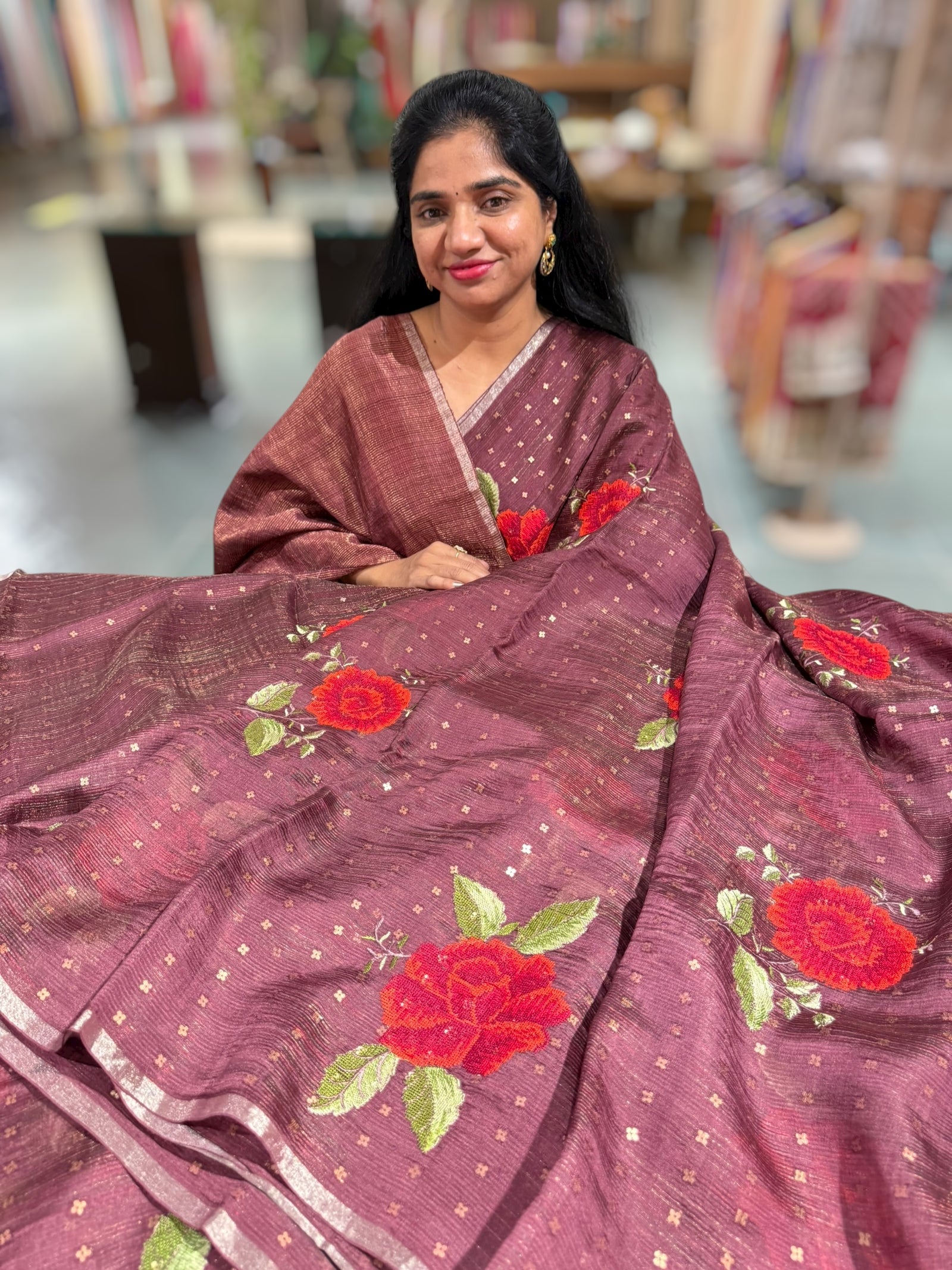 Winish brown Tussar Kota Saree with embedded sequnce and hibuscus flower embroidery