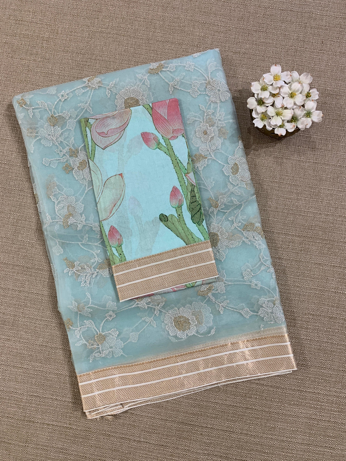 Baby Blue Muslin allover embroidered Saree with pichwai printed blosue