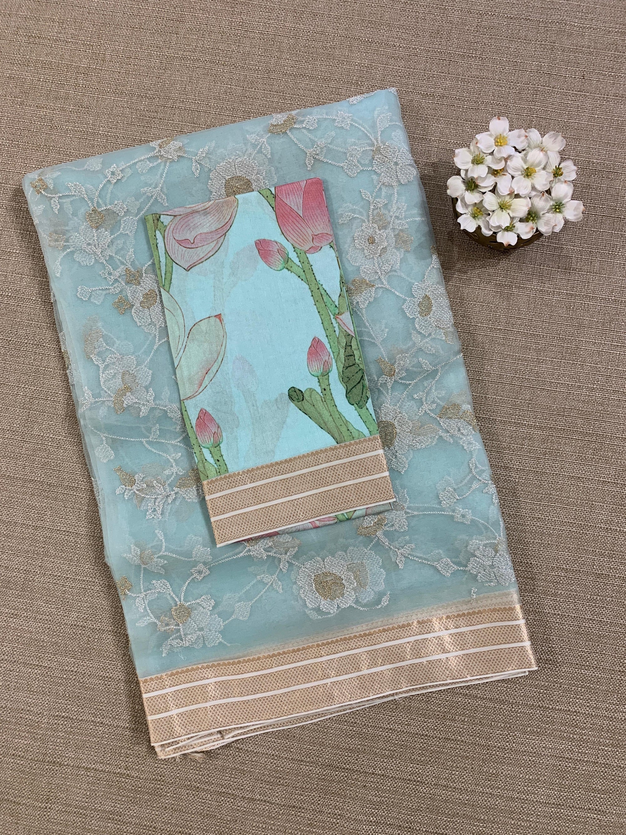 Baby Blue Muslin allover embroidered Saree with pichwai printed blosue