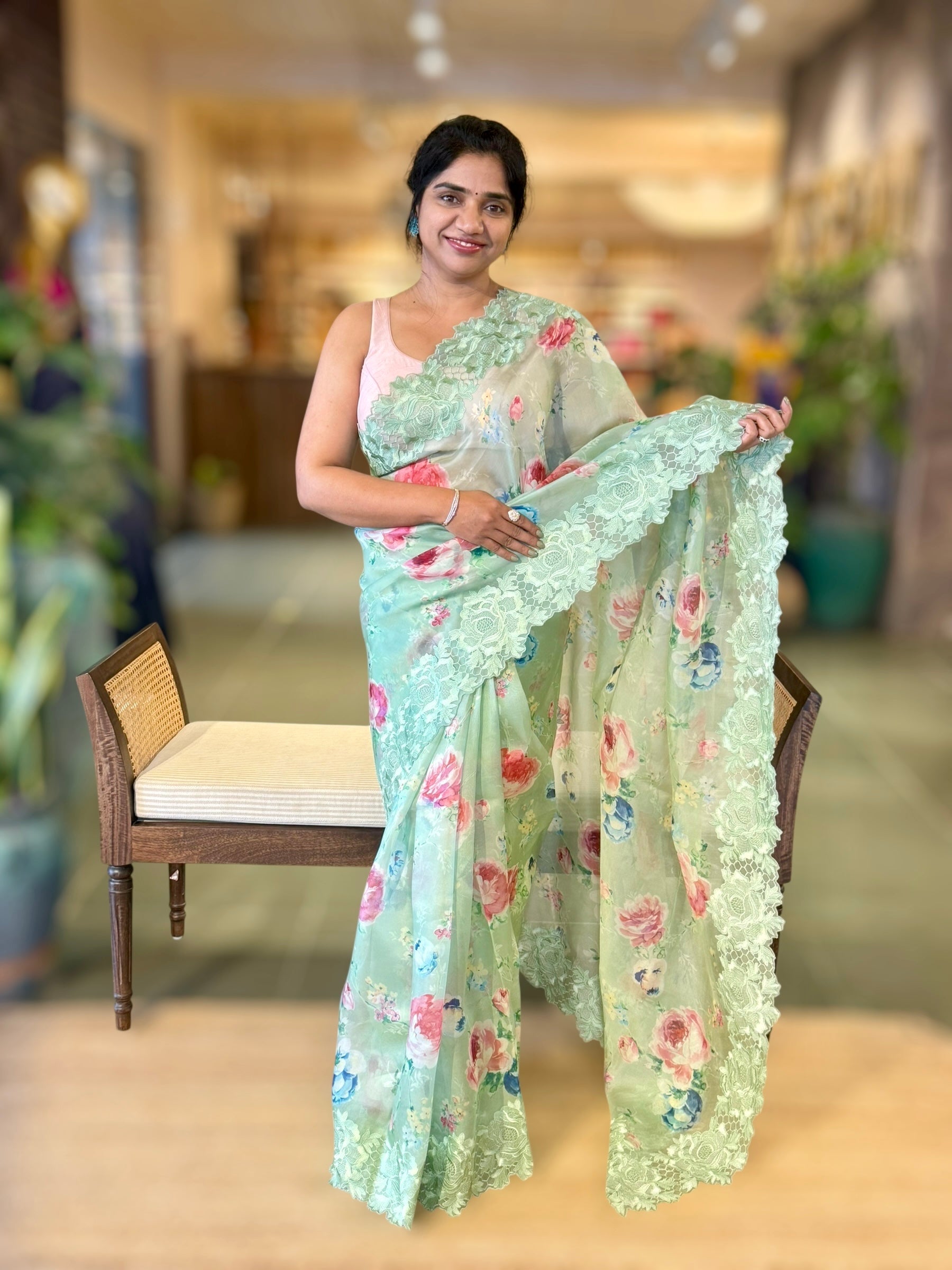 Mint Floral Printed Organza Saree With Chantilly Lace Style Embroidered Border.