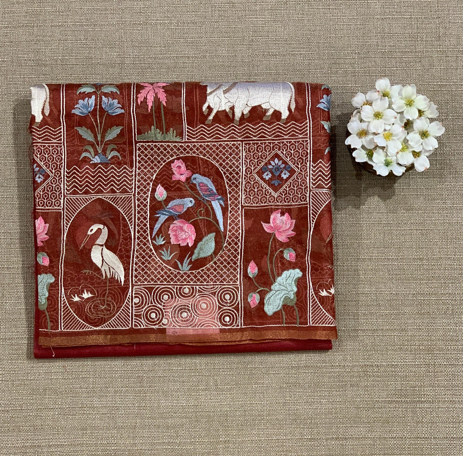 Rust Red/ Brick Red Kora-Tussar blend Handloom Saree with Tissue embroidered Skirt Border