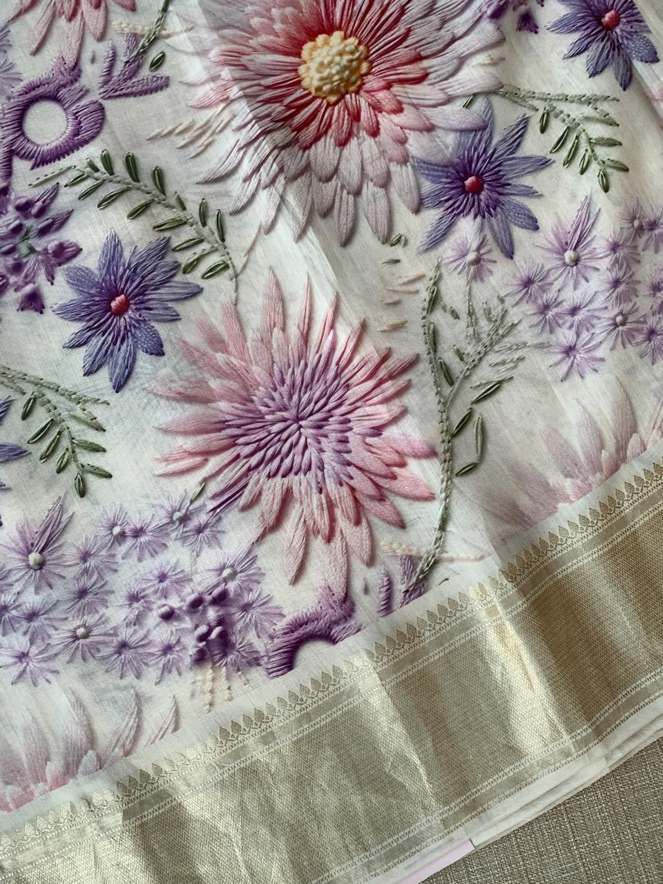 Ivory Pure Handloom Chiniya Silk Saree with stunning Floral Print and zari borders