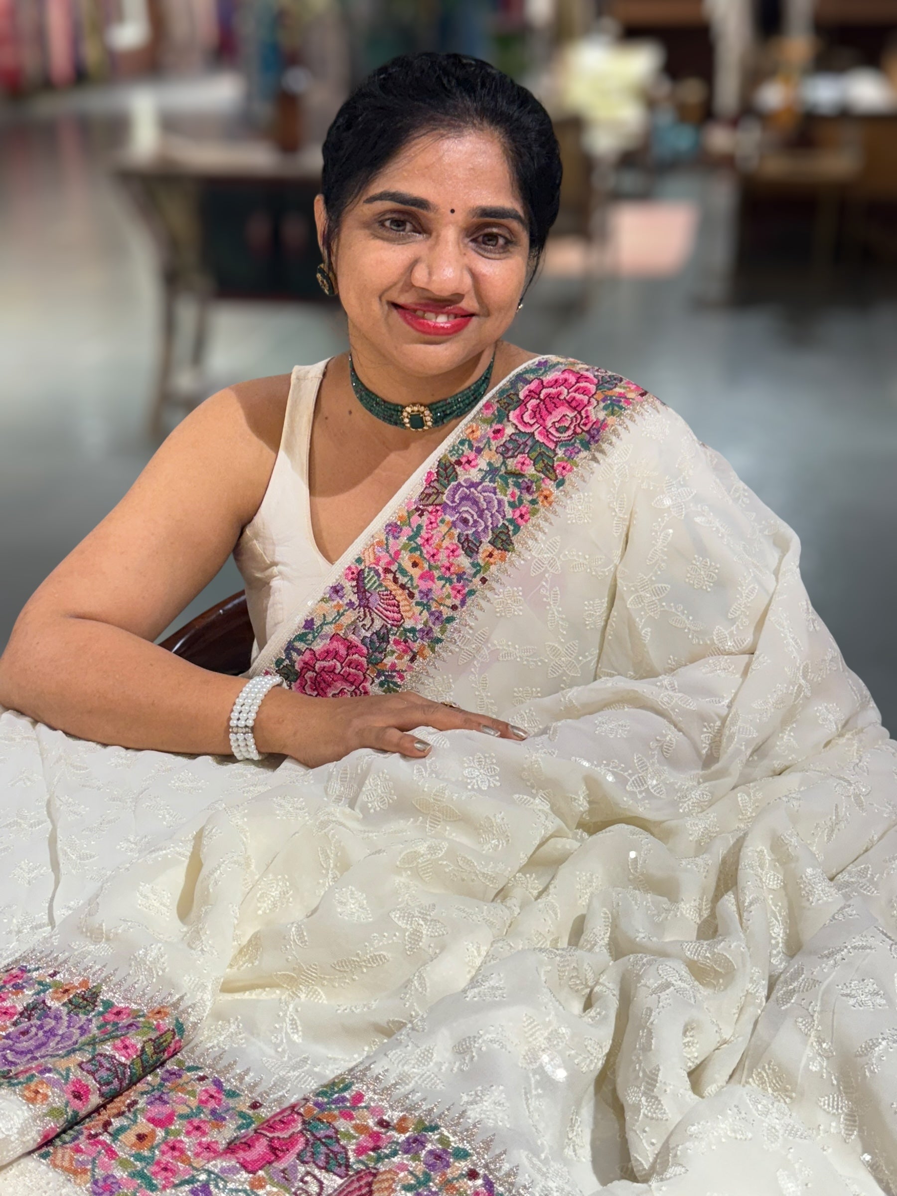 Halfwhite Georgette Saree with allover Chikankari Embroidery and Petite Point border