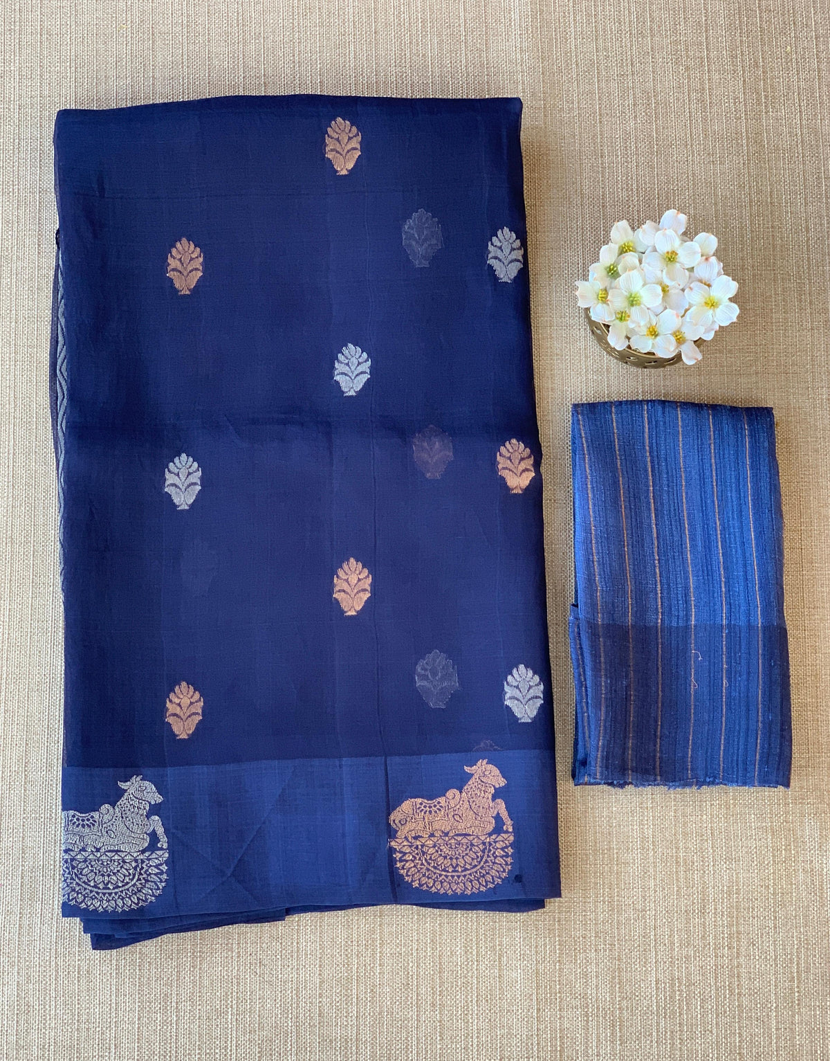 Midnight Blue  kora muslin sarees with kaduwa woven nandi motif border