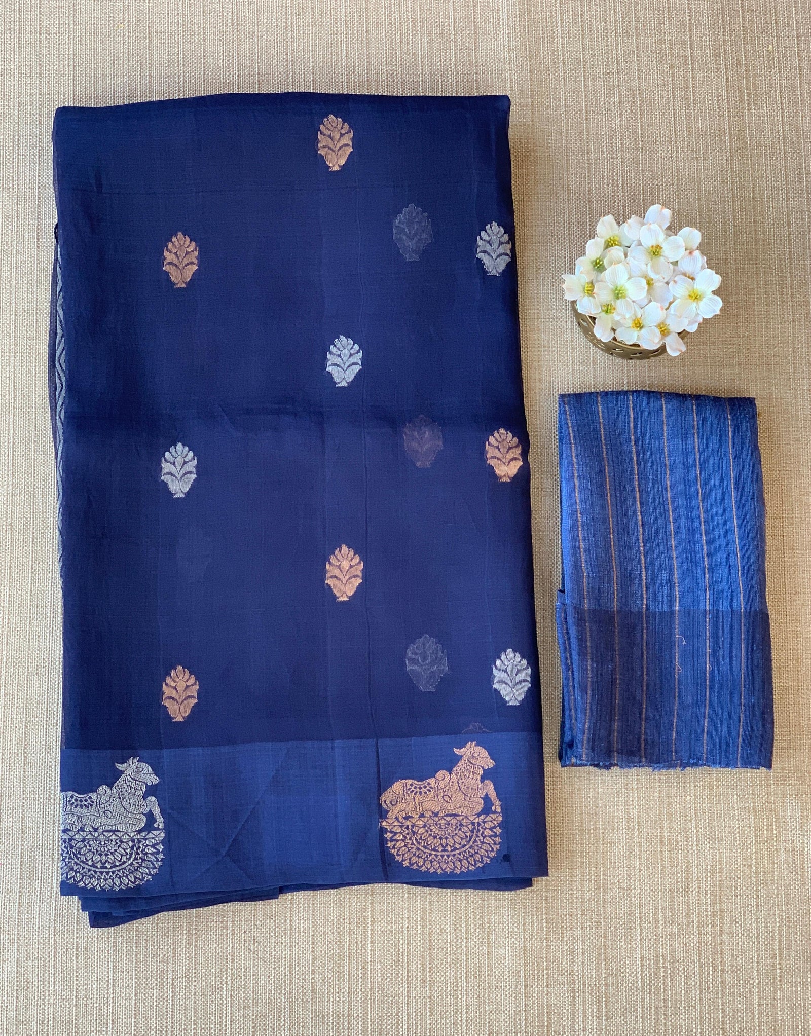Midnight Blue  kora muslin sarees with kaduwa woven nandi motif border