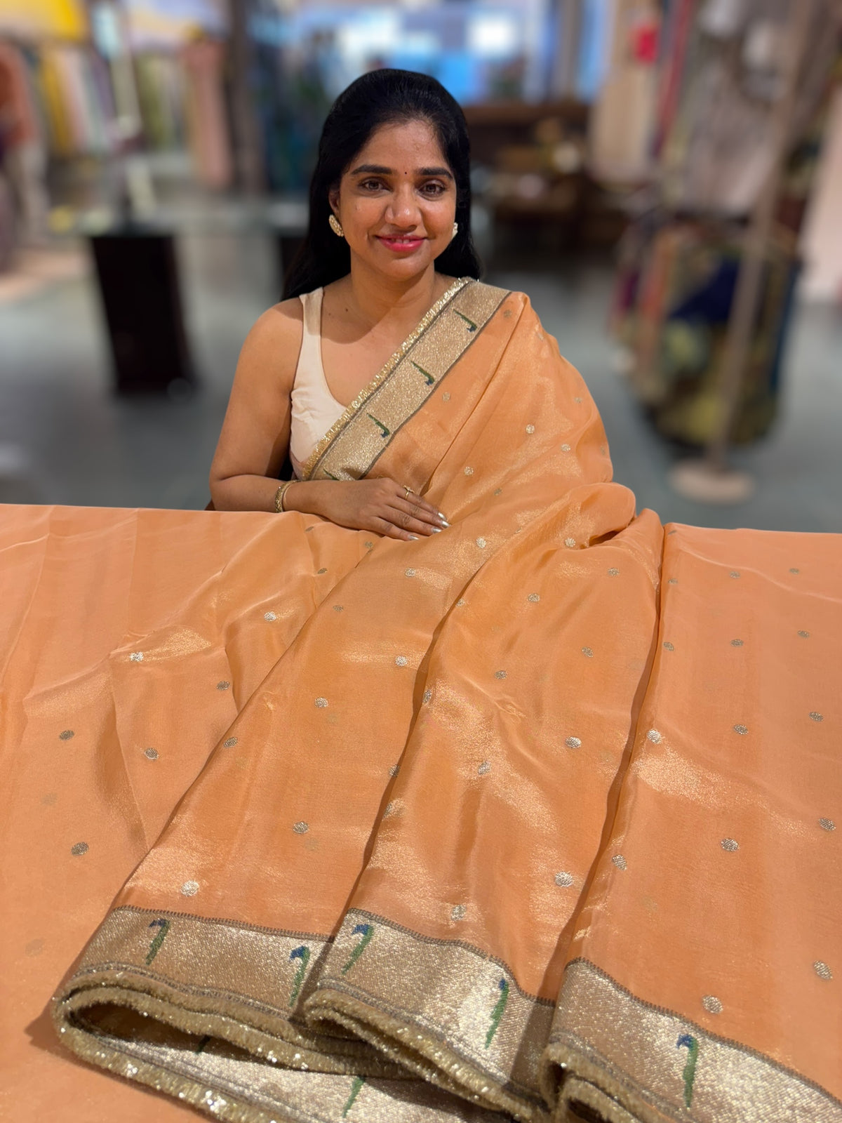 Peach Tissue Saree with pythani tissue embroidered border