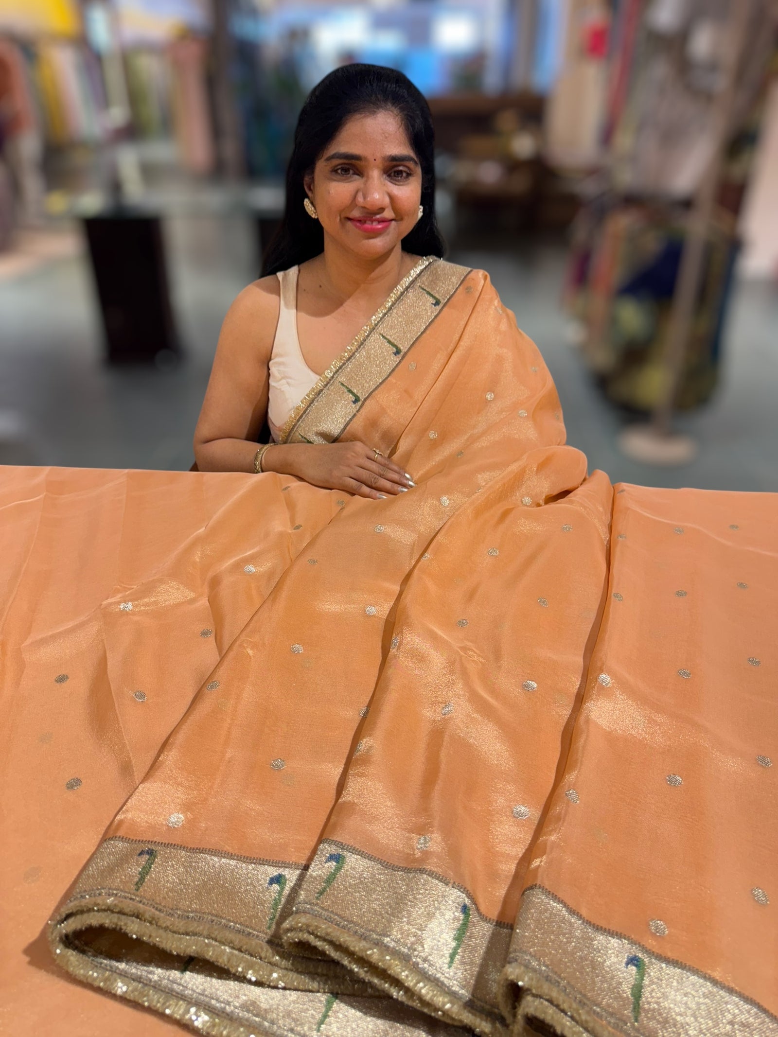 Peach Tissue Saree with pythani tissue embroidered border