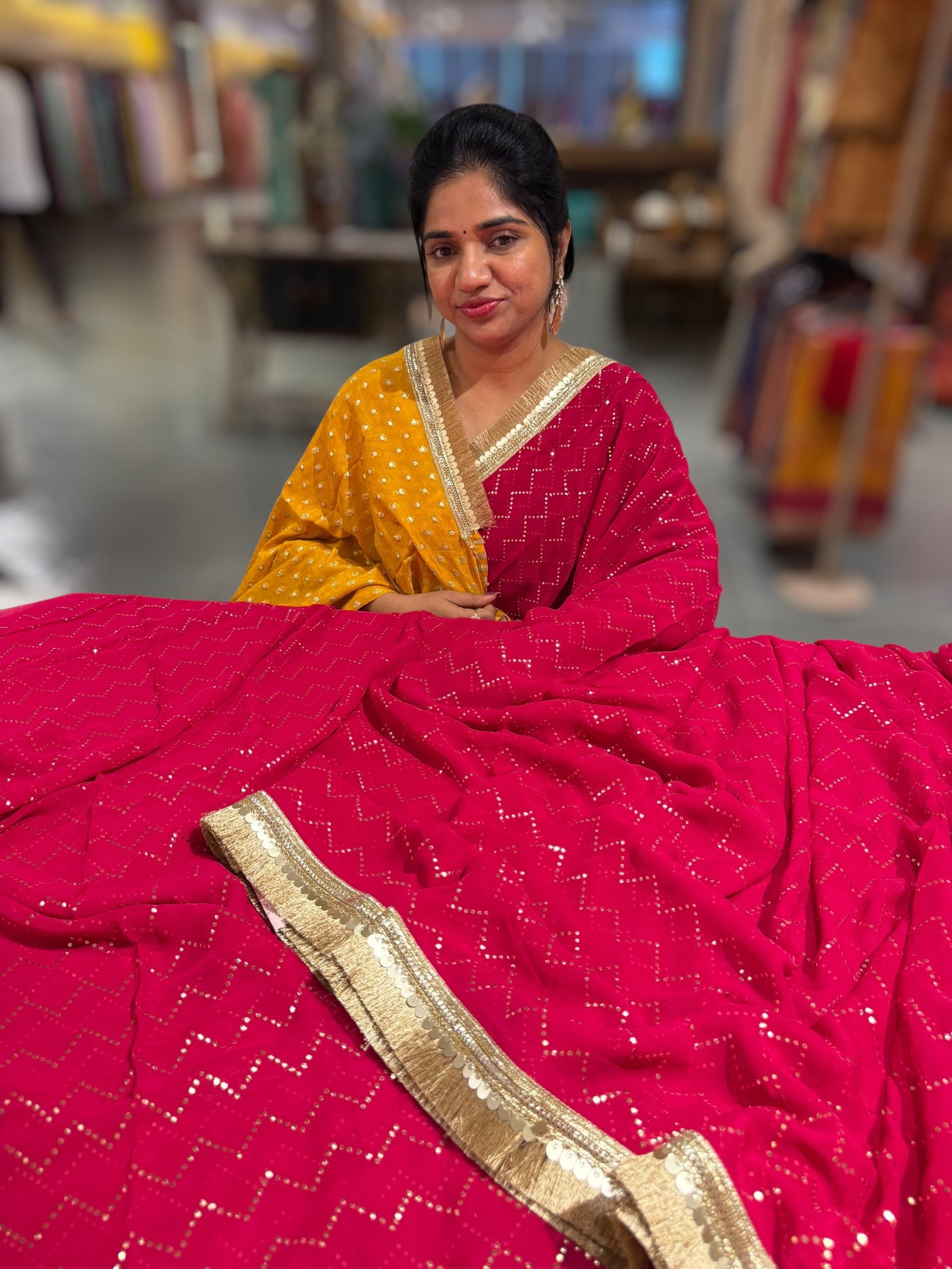Dark Pink Georgette Saree with stick on Badla in zigzag pattern