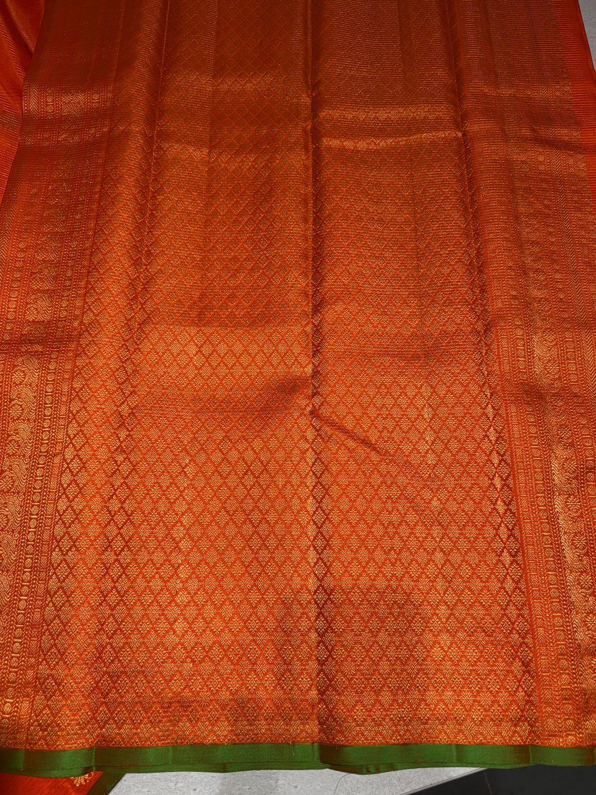 Orange Kanjeevaram Saree with vaira oosi stripes