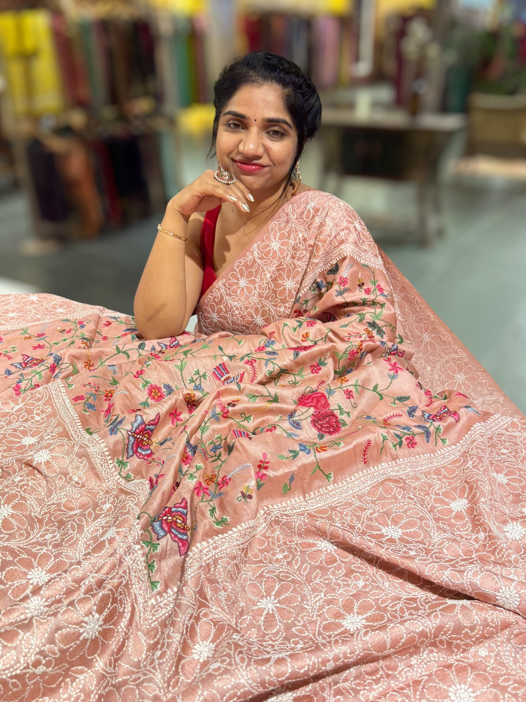 Peach Pink Tussar Saree with lucknowi border and pallu with allover petite point embroidery.