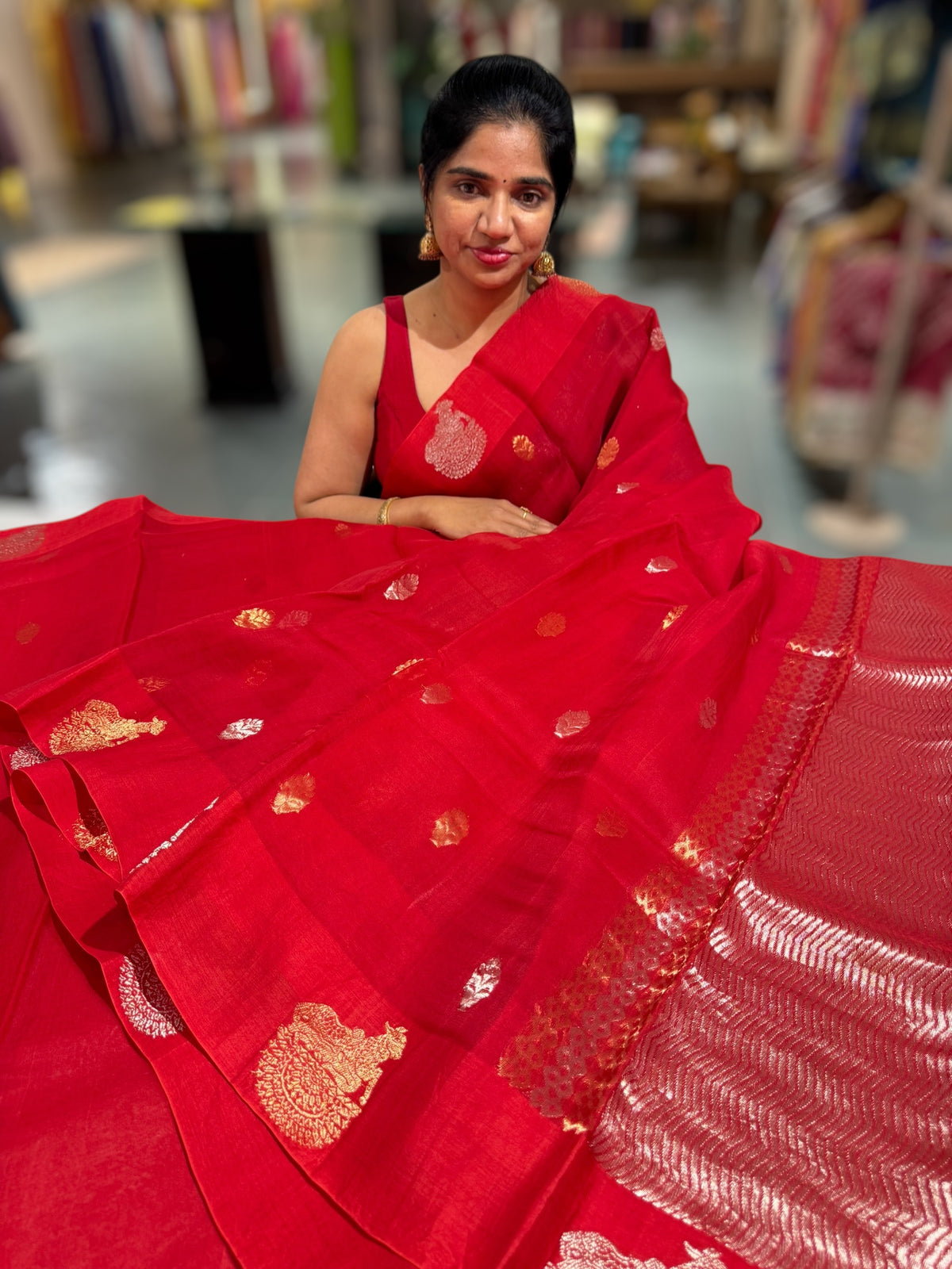 Red kora muslin sarees with kaduwa woven nandi motif border