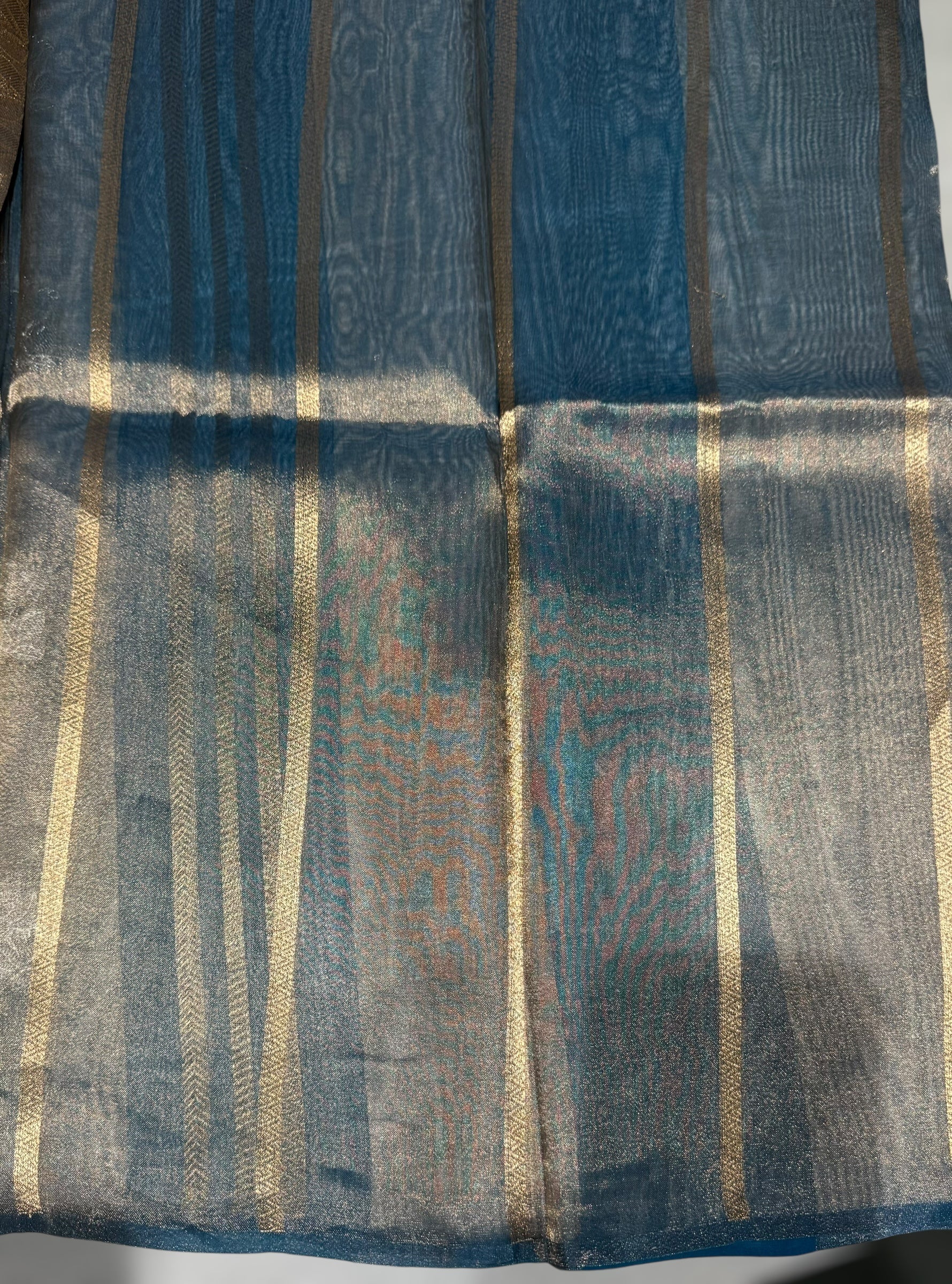 Peacock Blue Banarasi Handloom Kora Tissue Stripes with allover kaduwa woven lotus  motifs .