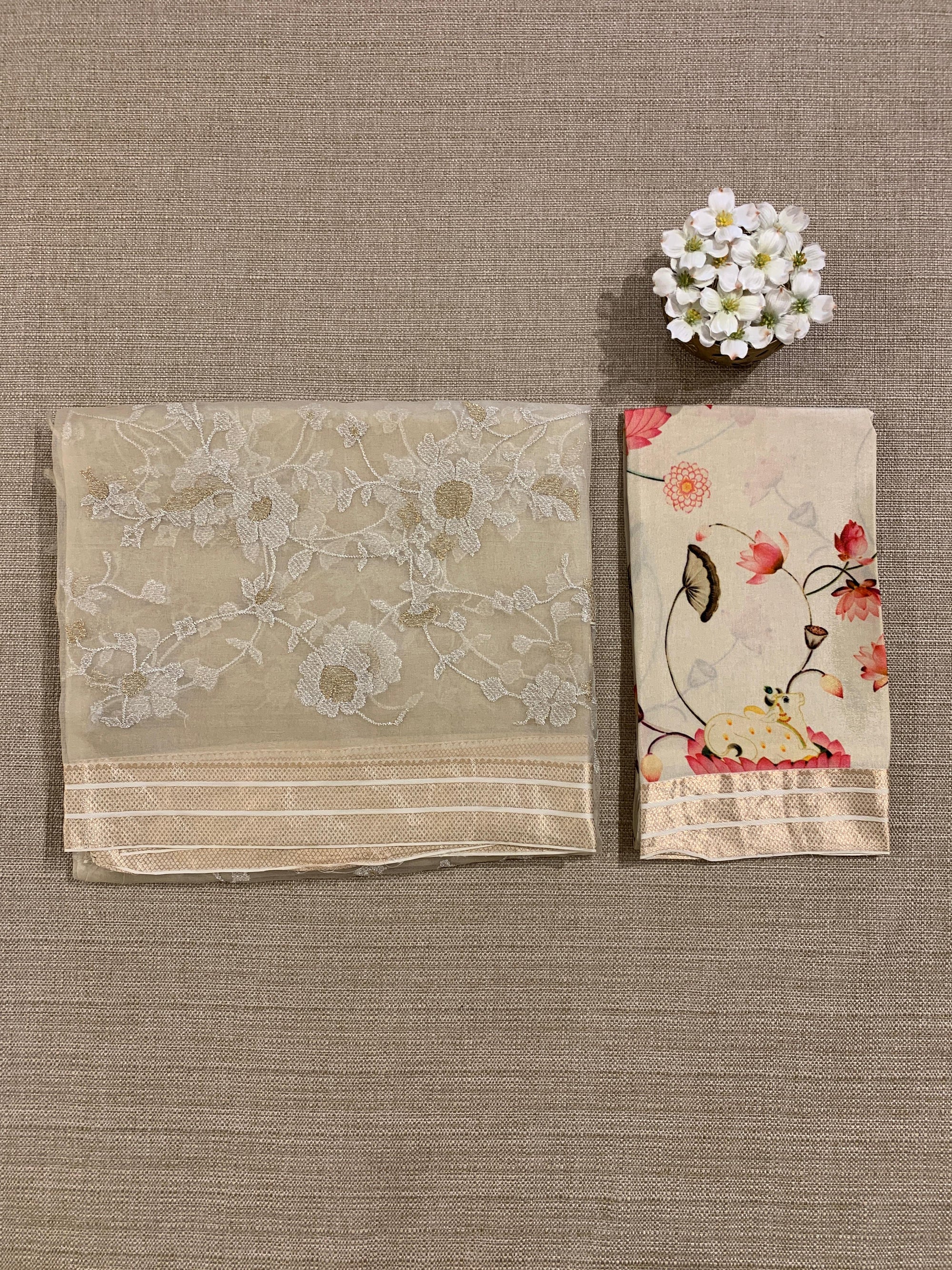 Beige Muslin allover embroidered Saree with pichwai printed blosue
