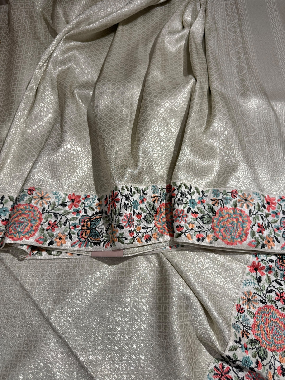 Half White Banarasi  brocade Silk Saree with Petite Point Embroidered Border.