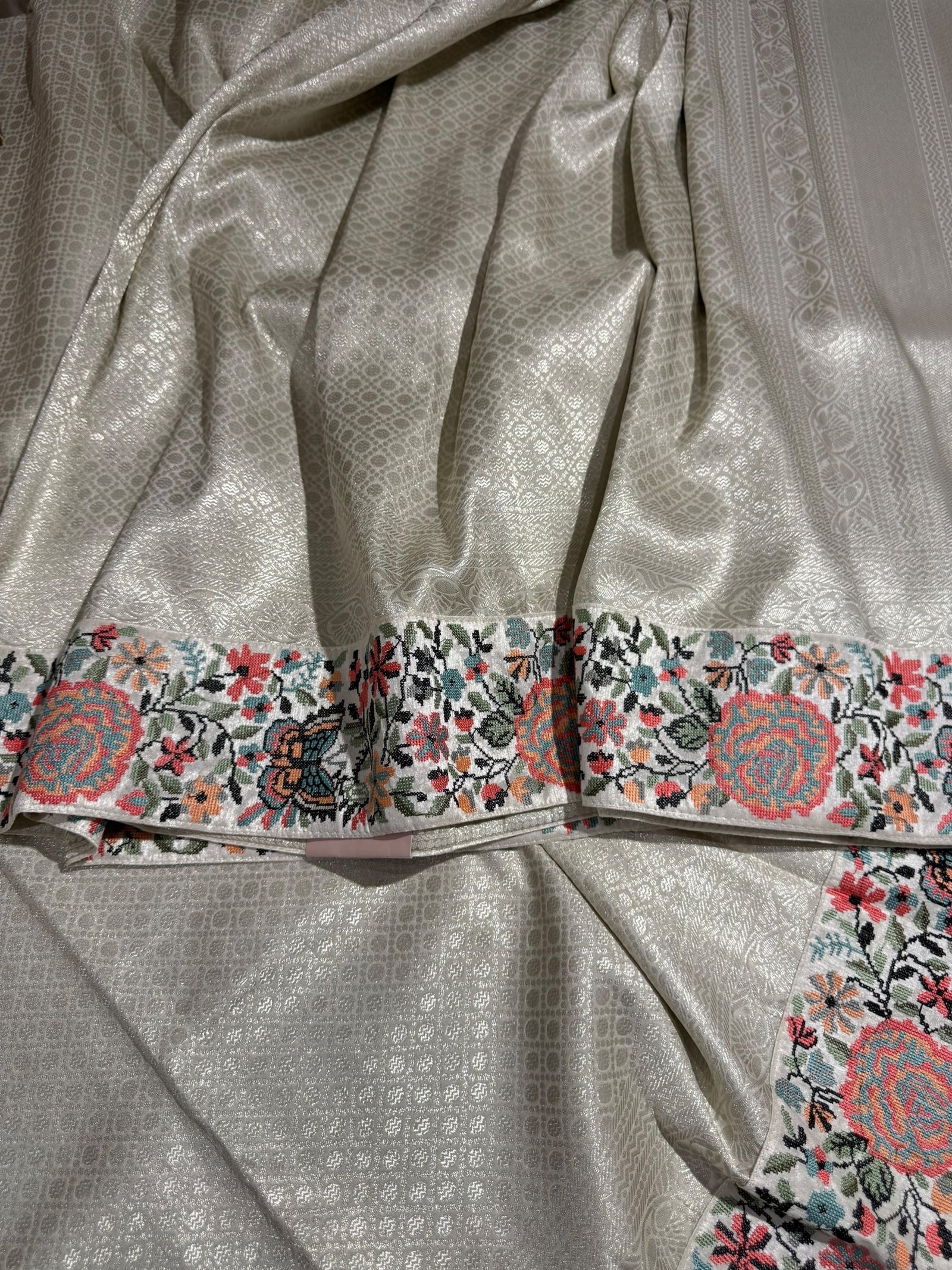 Half White Banarasi  brocade Silk Saree with Petite Point Embroidered Border.