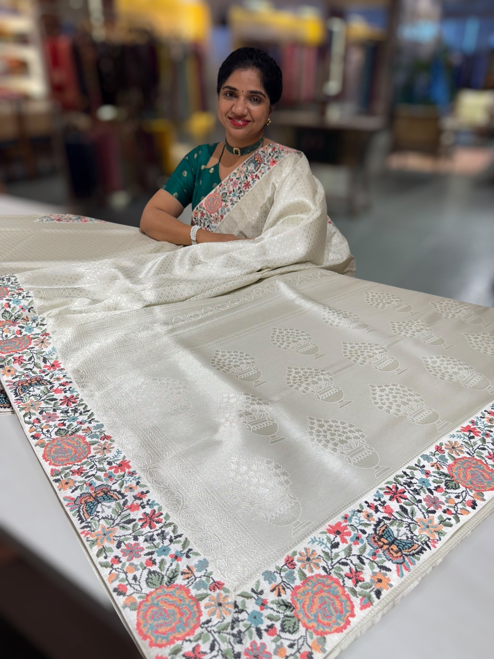 Half White Banarasi  brocade Silk Saree with Petite Point Embroidered Border.