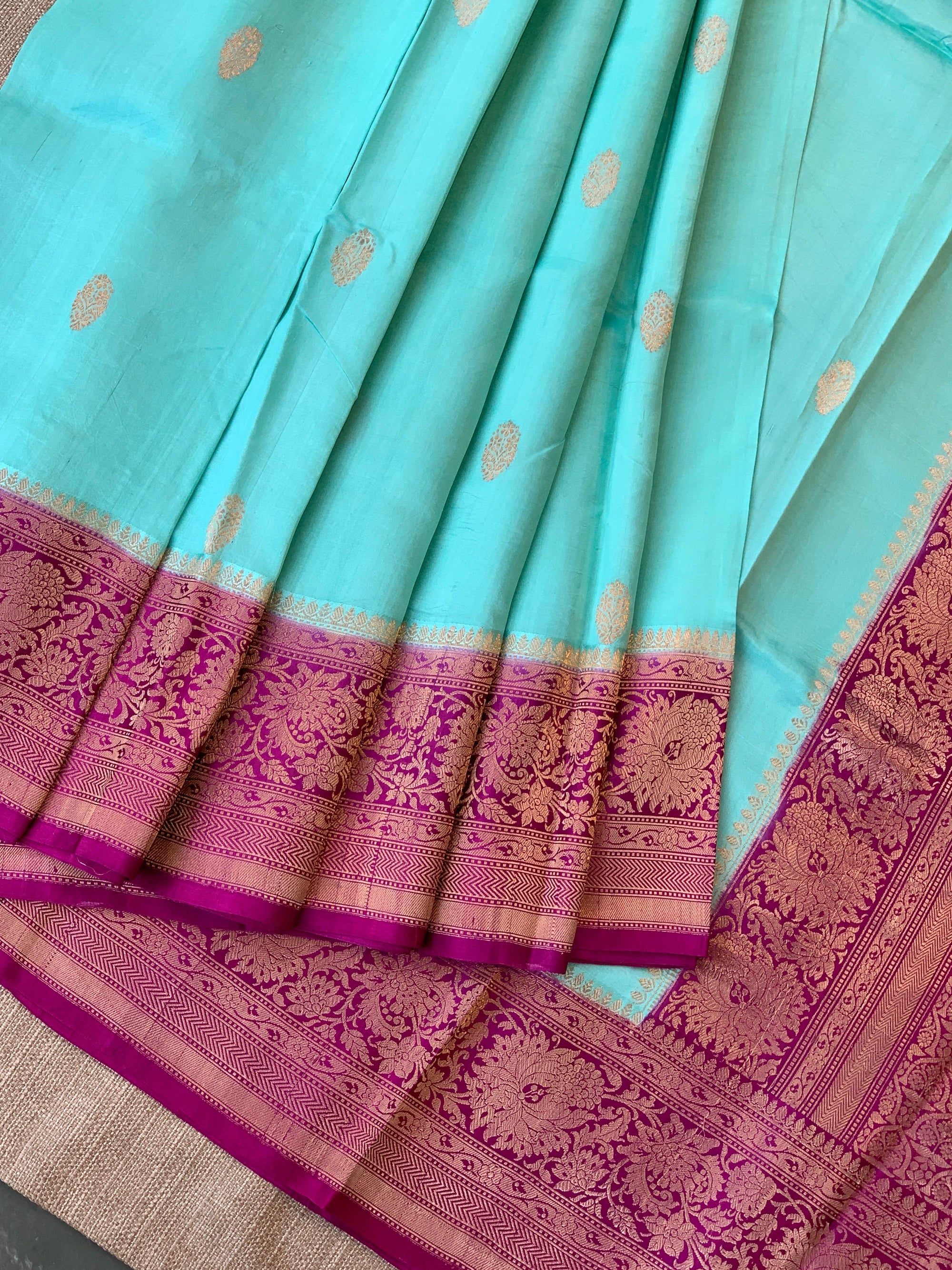 SeaBlue & Majenta Combo Raw Mangoe Silk Saree with heavy weaving mashru border & kaduwa woven motifs.