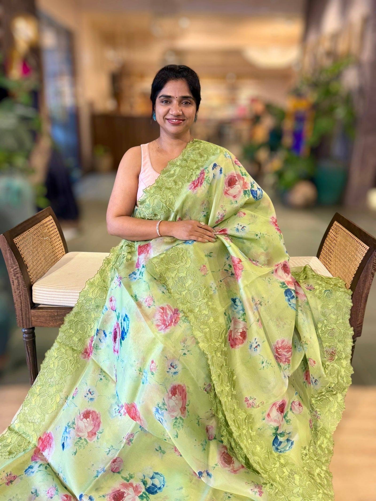 Parrot Green Printed Organza Saree With Chantilly Lace Style Embroidered Border.